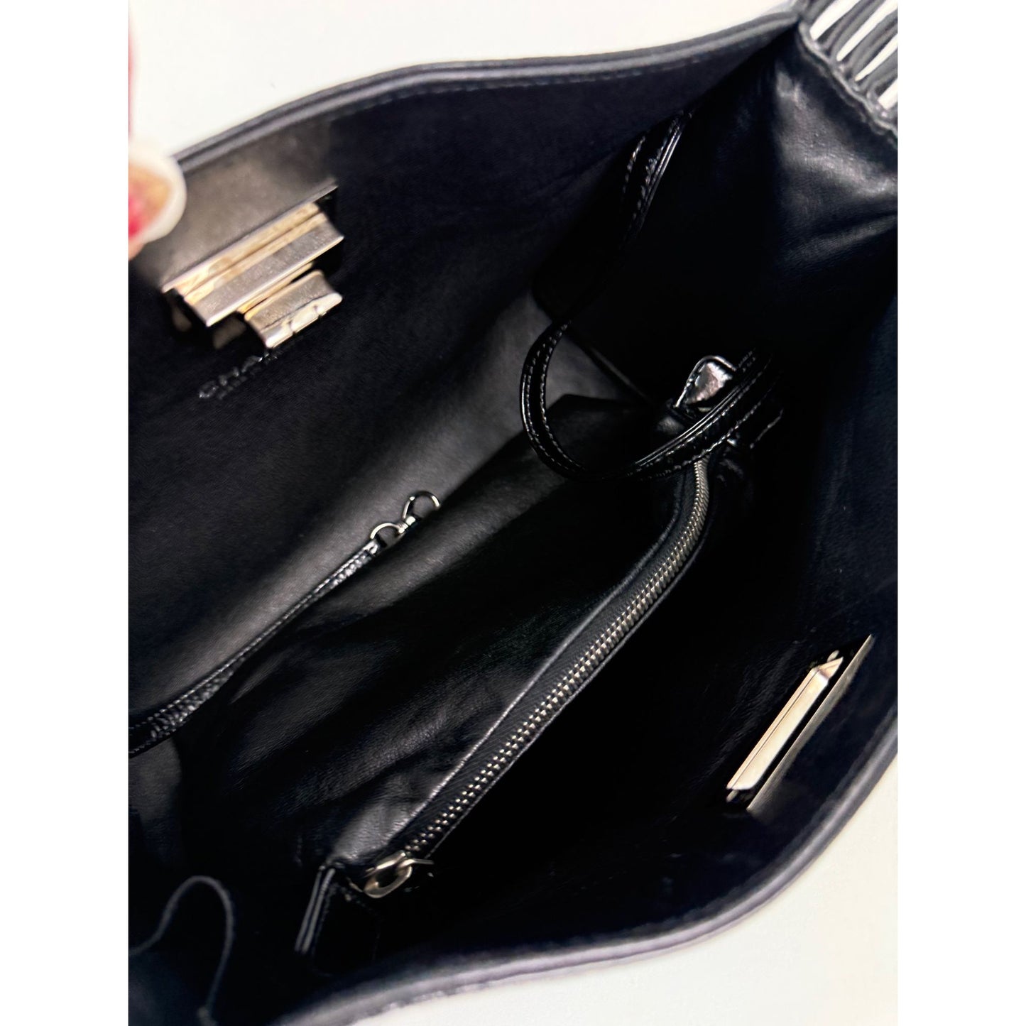 
                  
                    Chanel Patent Mademoiselle lock Convertible Wrist Clutch Black Bag
                  
                