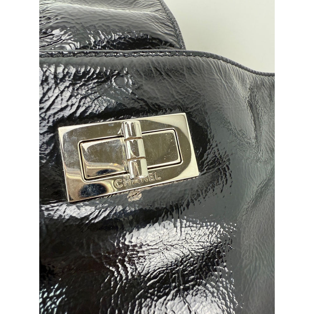 
                  
                    Chanel Patent Mademoiselle lock Convertible Wrist Clutch Black Bag
                  
                