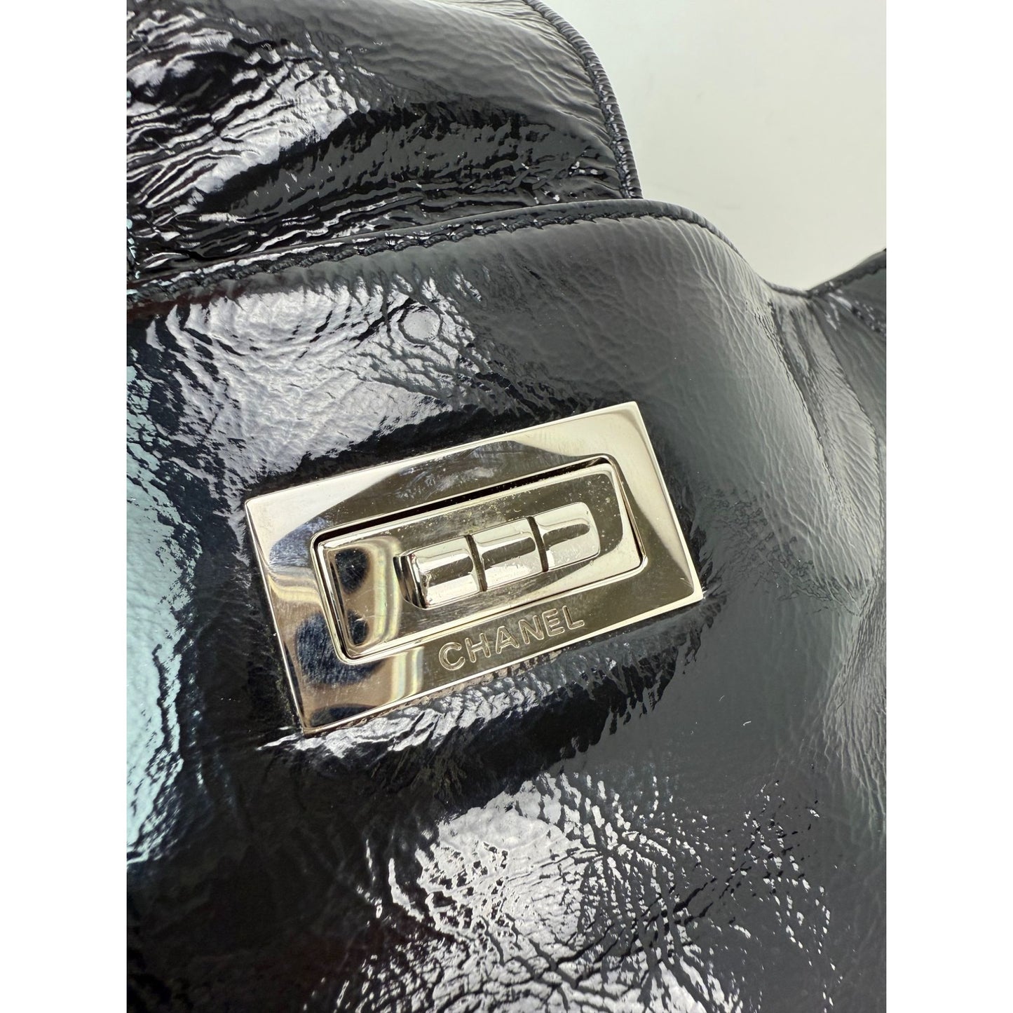 
                  
                    Chanel Patent Mademoiselle lock Convertible Wrist Clutch Black Bag
                  
                