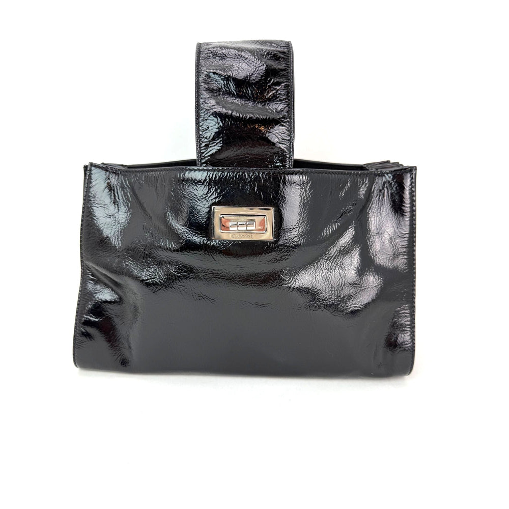 
                  
                    Chanel Patent Mademoiselle lock Convertible Wrist Clutch Black Bag
                  
                