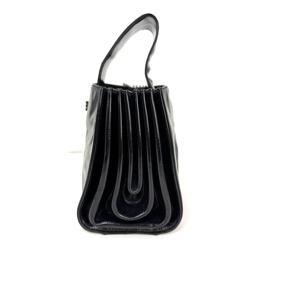
                  
                    Chanel Patent Mademoiselle lock Convertible Wrist Clutch Black Bag
                  
                