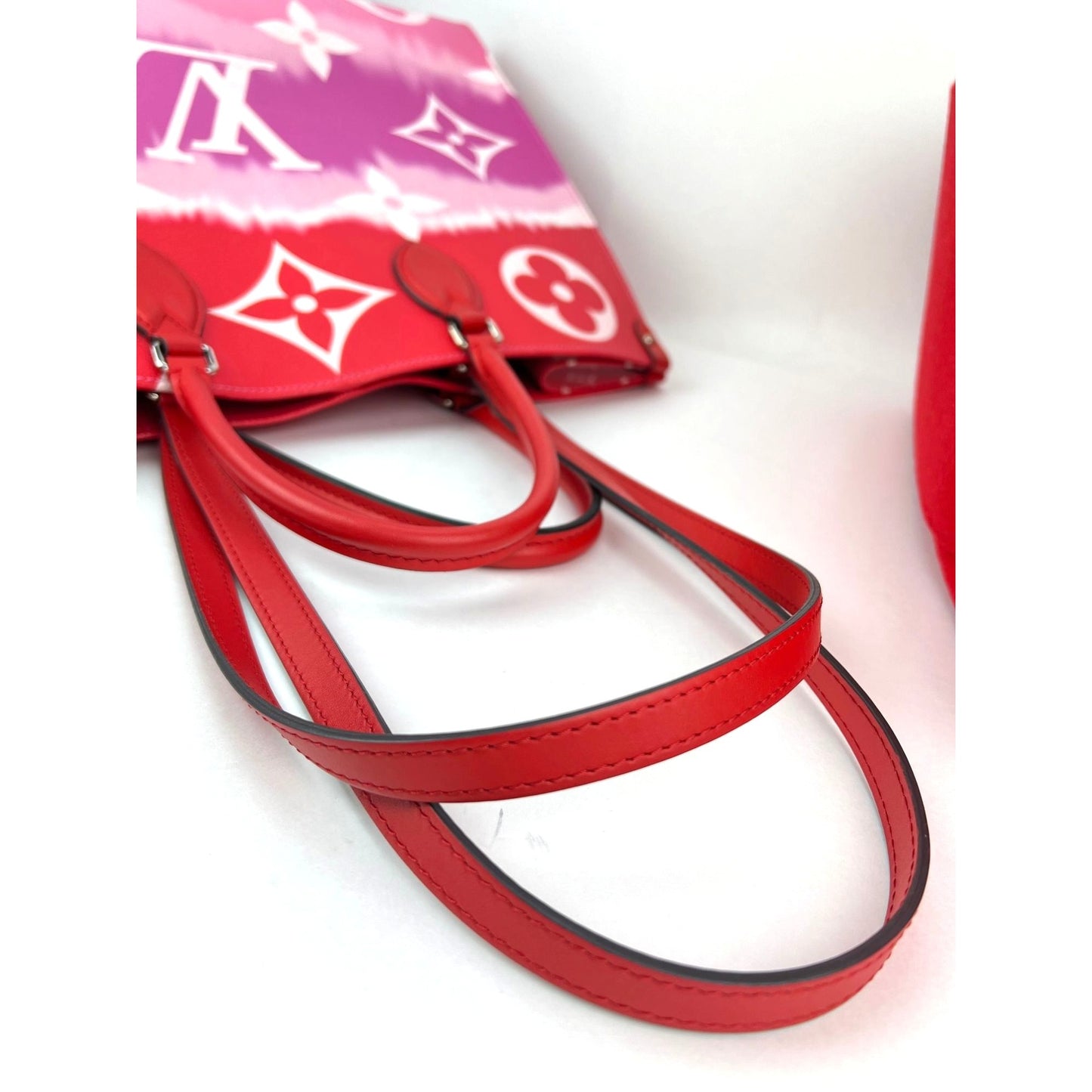 
                  
                    Louis Vuitton ONTHEGO GM Escale Rouge Giant Monogram Tote
                  
                