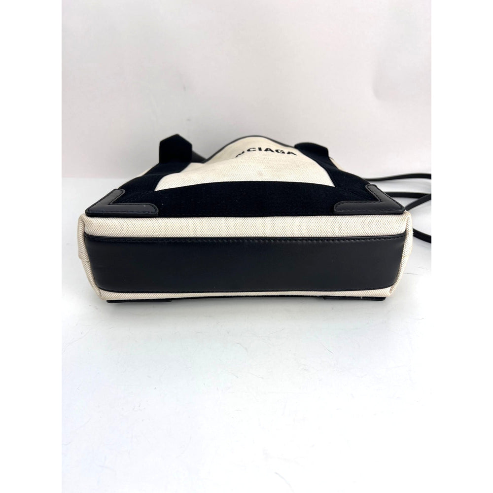 
                  
                    Balenciaga Cotton Canvas Calfskin Navy Cabas XS Natural Black Tote Bag
                  
                