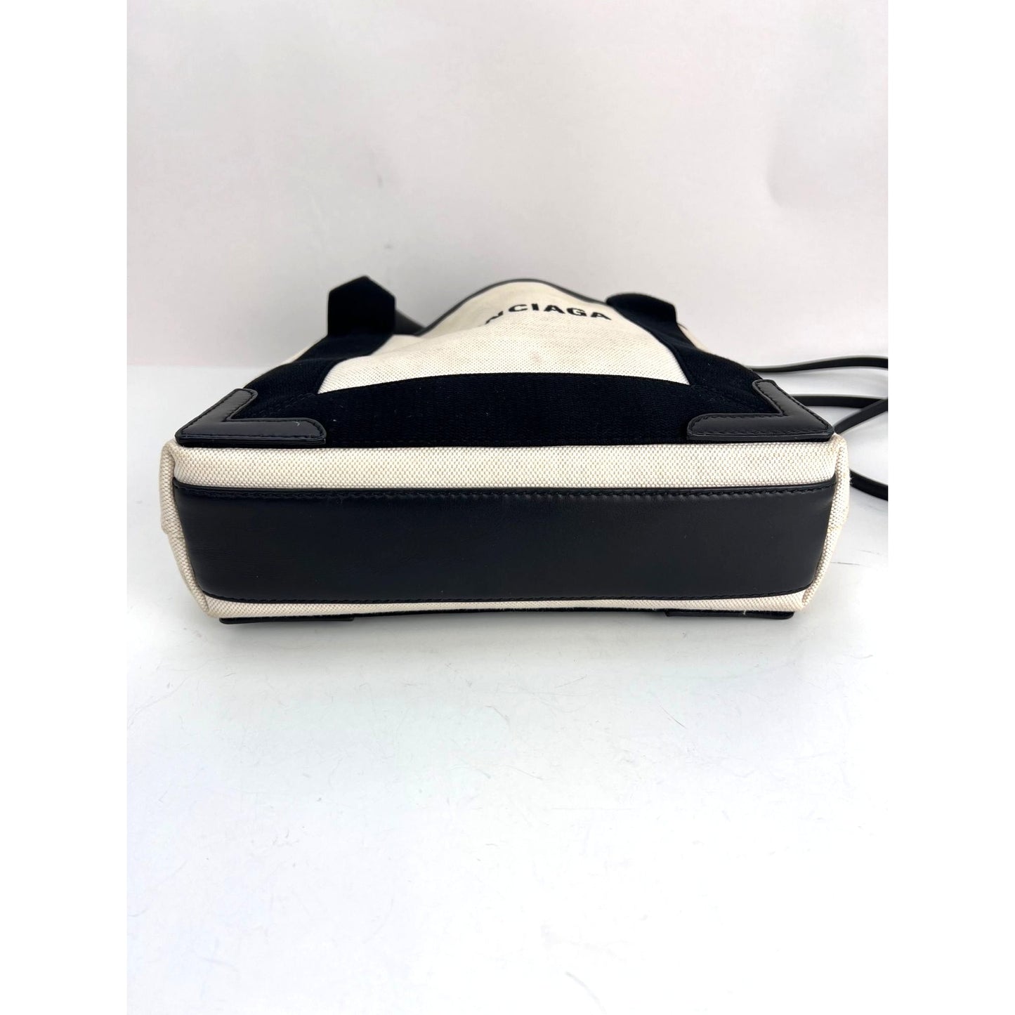 
                  
                    Balenciaga Cotton Canvas Calfskin Navy Cabas XS Natural Black Tote Bag
                  
                