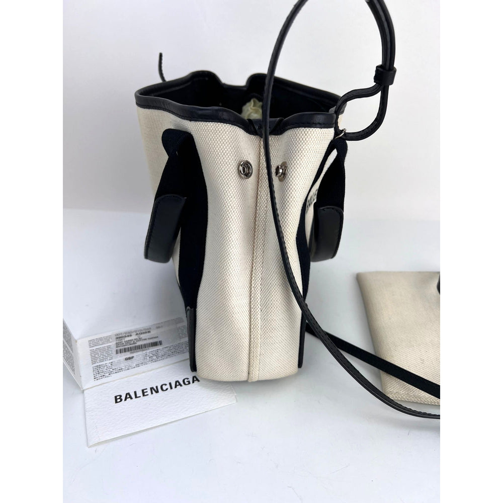
                  
                    Balenciaga Cotton Canvas Calfskin Navy Cabas XS Natural Black Tote Bag
                  
                