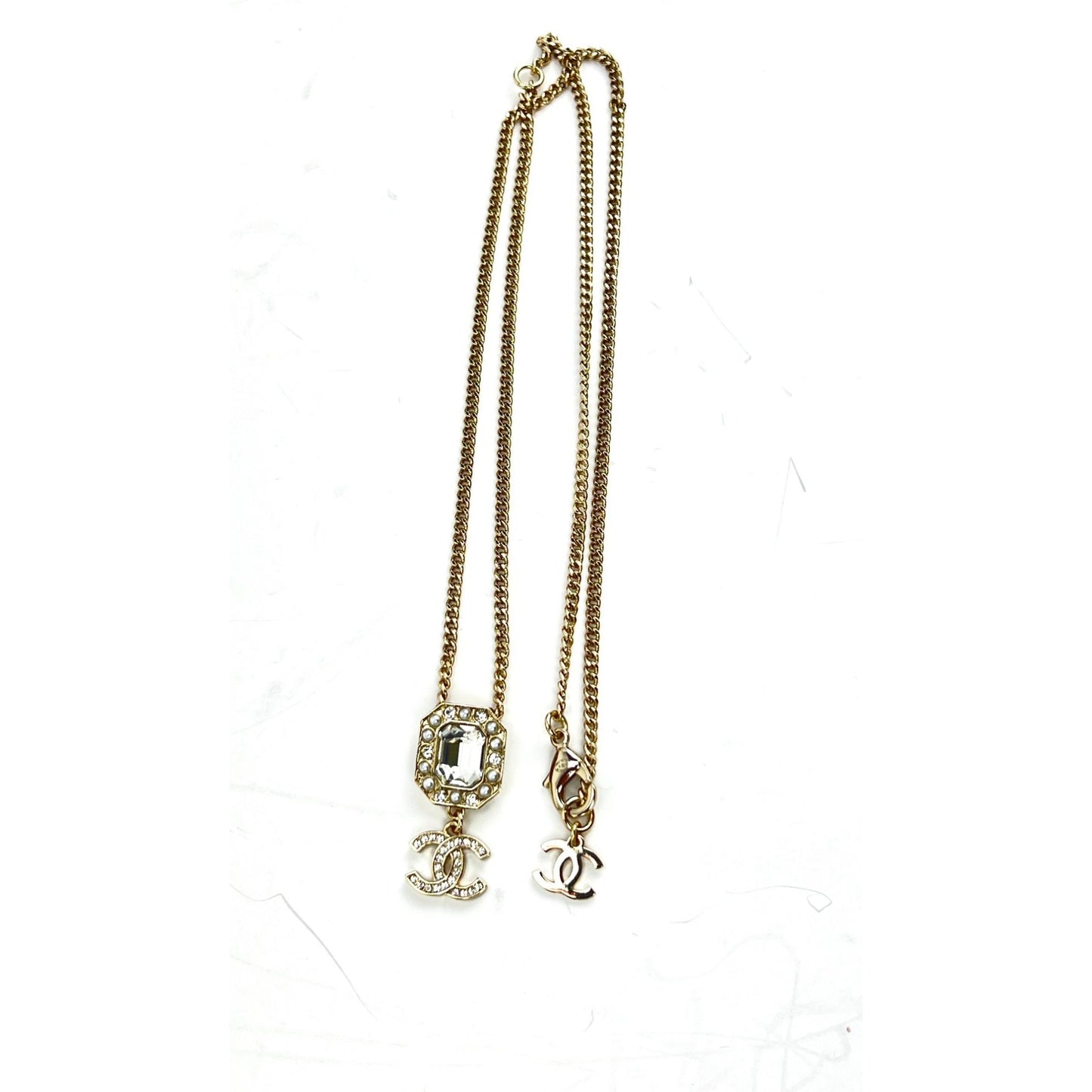 
                  
                    Chanel Gold Tone CC Pearl Crystal Pendant Necklace
                  
                
