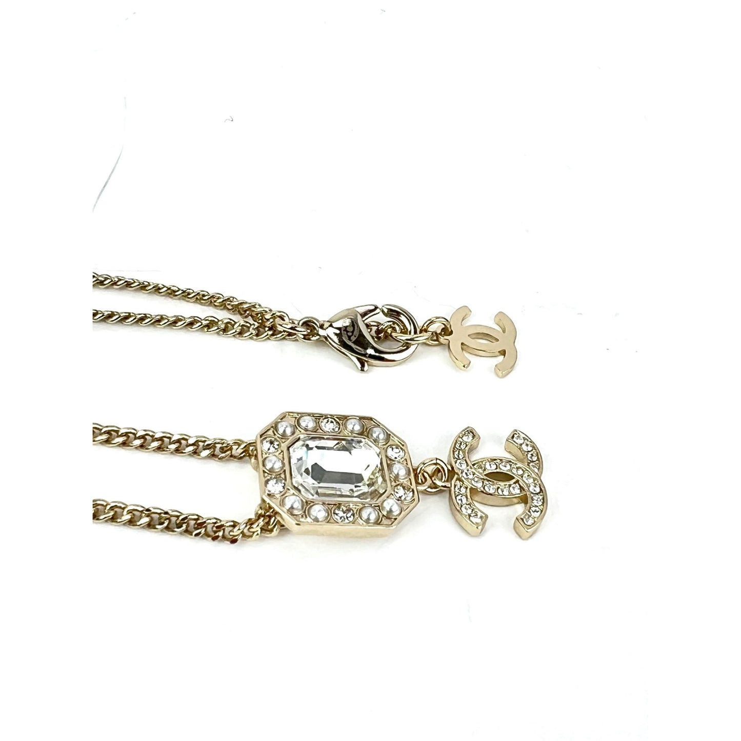 
                  
                    Chanel Gold Tone CC Pearl Crystal Pendant Necklace
                  
                