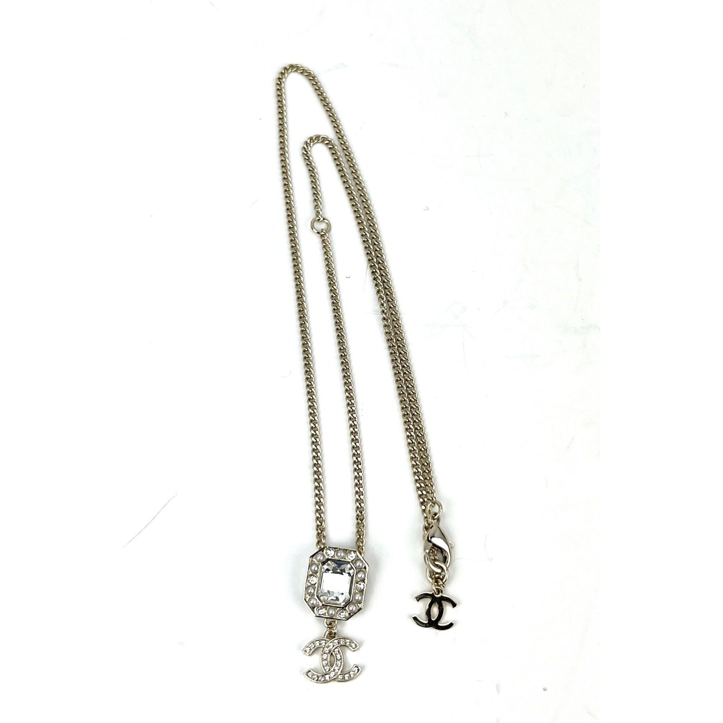 
                  
                    Chanel Gold Tone CC Pearl Crystal Pendant Necklace
                  
                