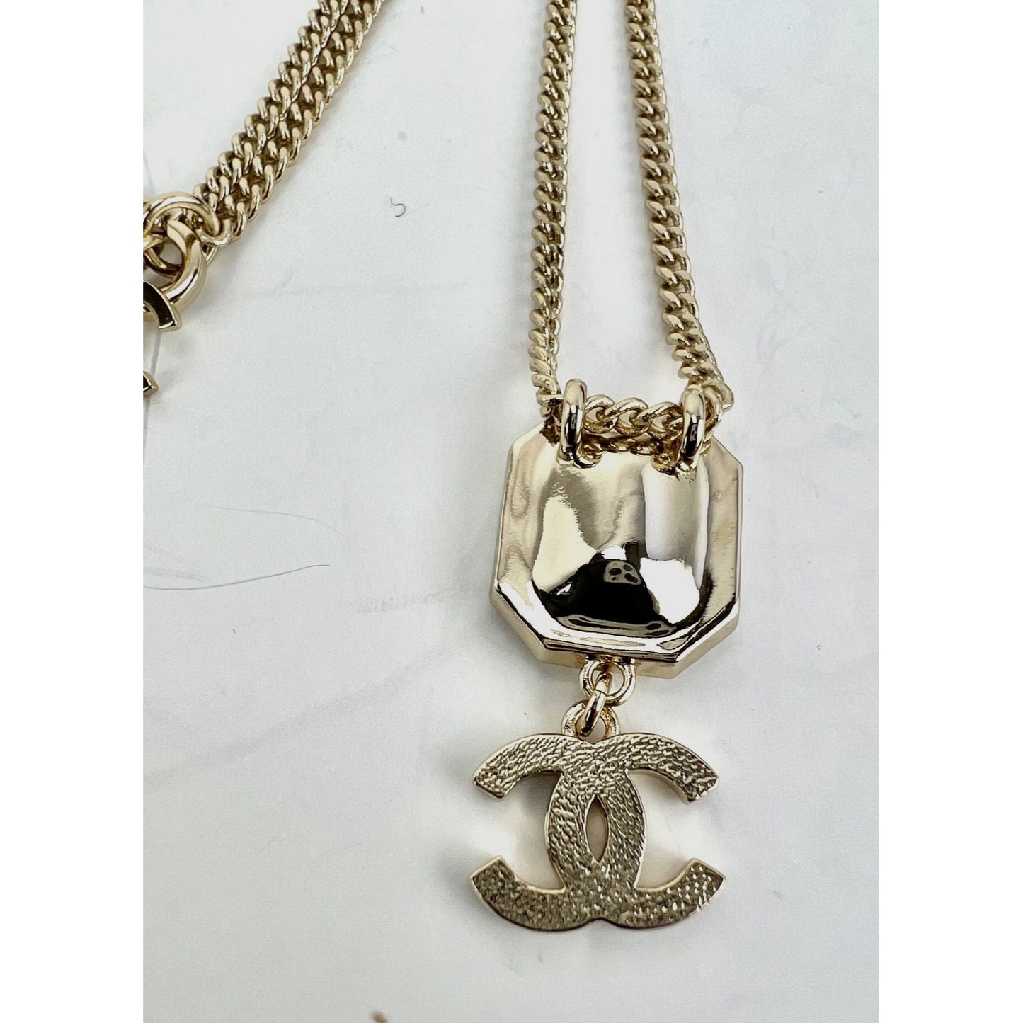 
                  
                    Chanel Gold Tone CC Pearl Crystal Pendant Necklace
                  
                