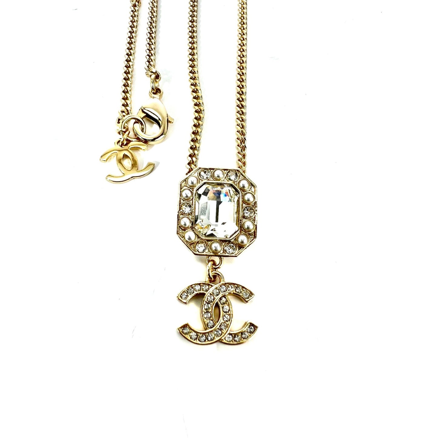 
                  
                    Chanel Gold Tone CC Pearl Crystal Pendant Necklace
                  
                