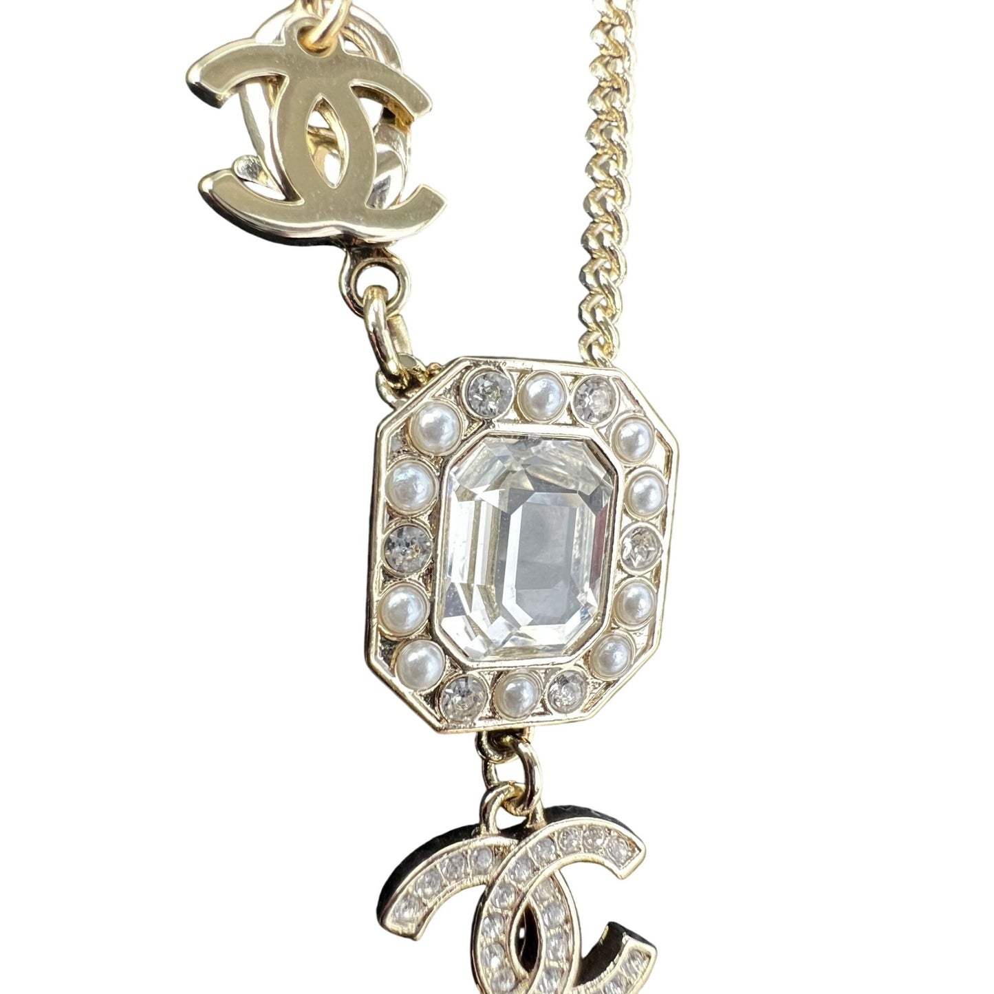 
                  
                    Chanel Gold Tone CC Pearl Crystal Pendant Necklace
                  
                