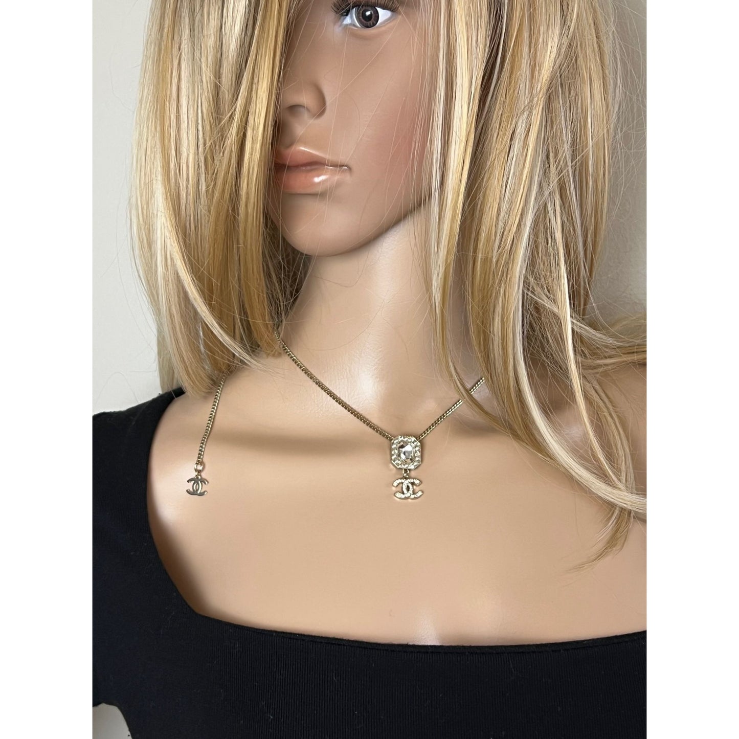 
                  
                    Chanel Gold Tone CC Pearl Crystal Pendant Necklace
                  
                