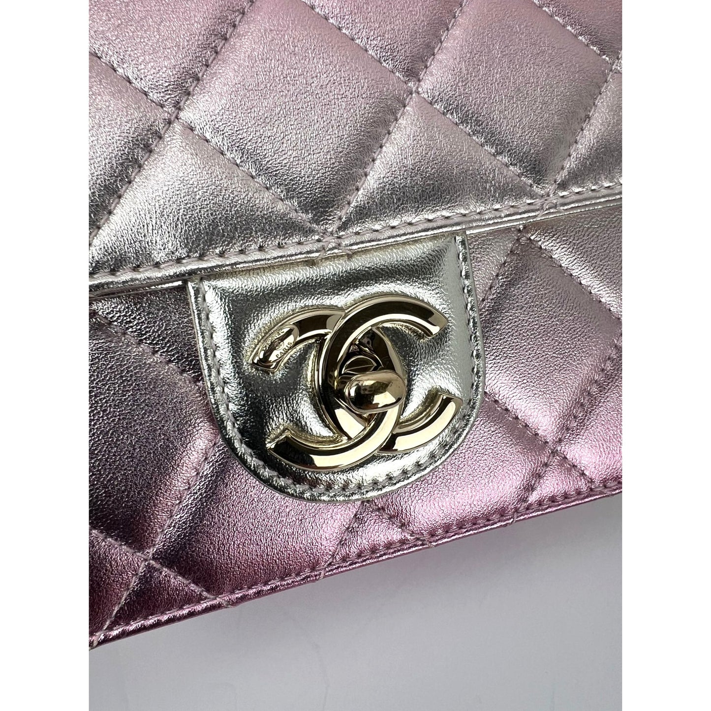 
                  
                    Chanel Metallic Lambskin Like a Wallet Flap Golden Pink Crossbody Bag
                  
                