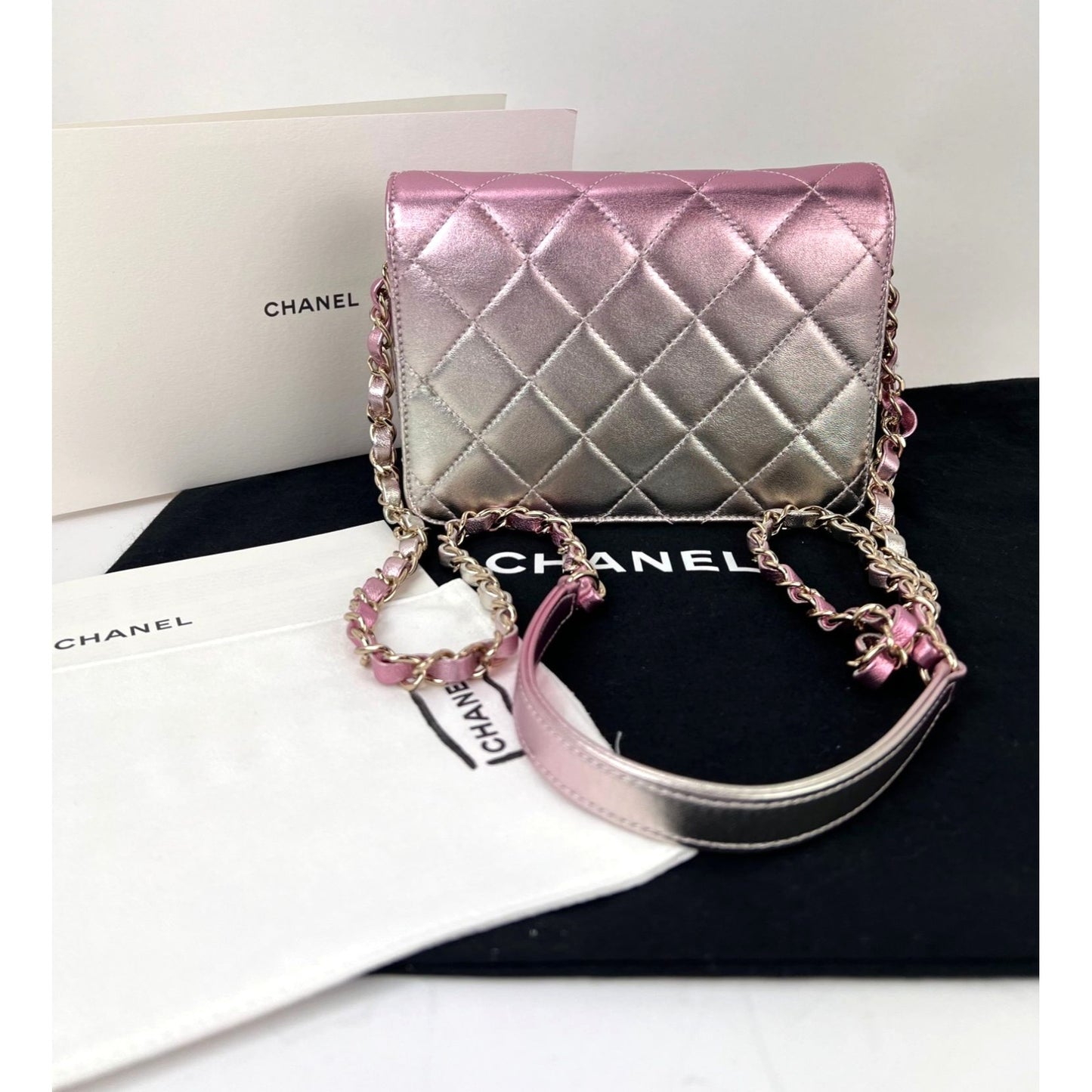 
                  
                    Chanel Metallic Lambskin Like a Wallet Flap Golden Pink Crossbody Bag
                  
                