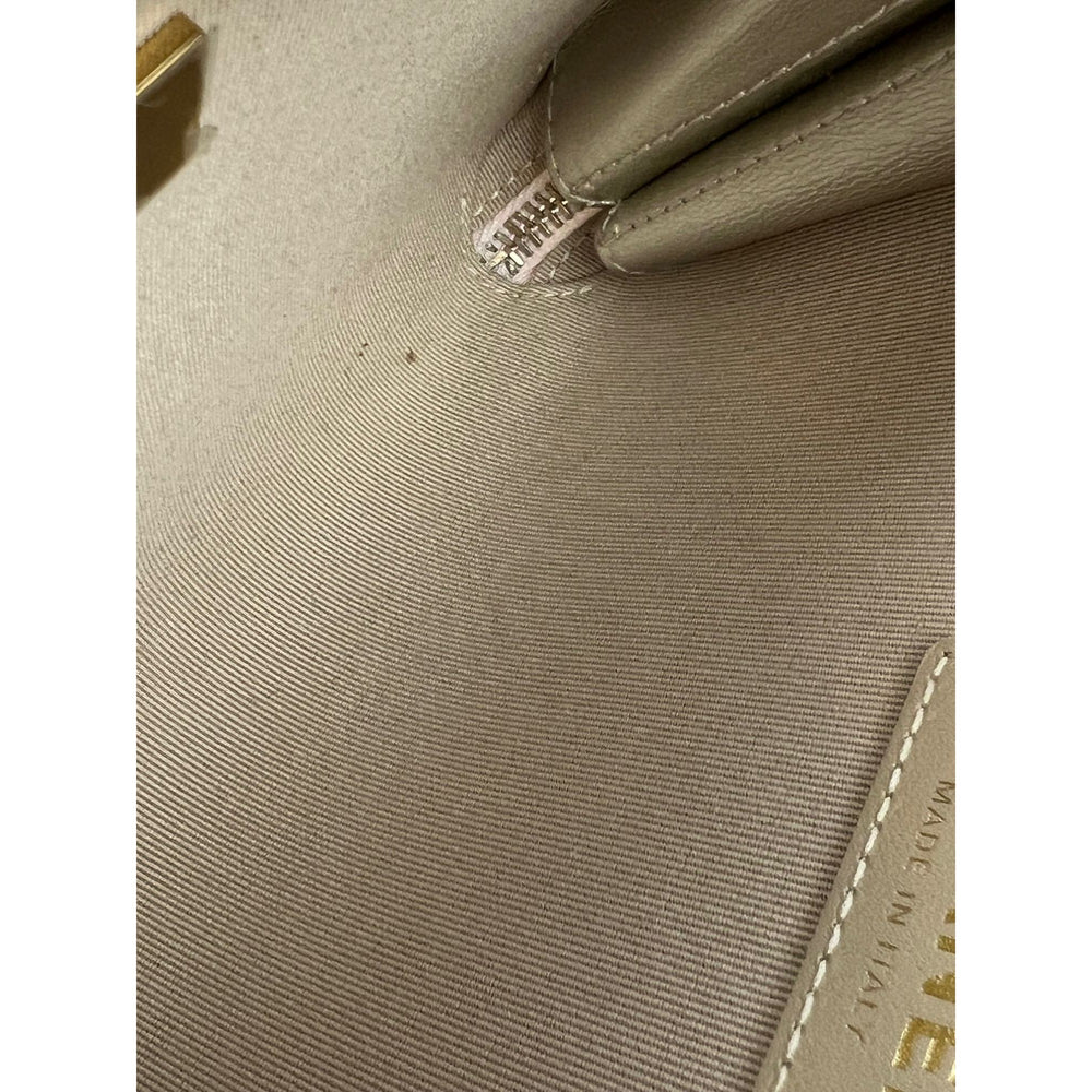 
                  
                    Chanel Metallic Lambskin Like a Wallet Flap Golden Pink Crossbody Bag
                  
                