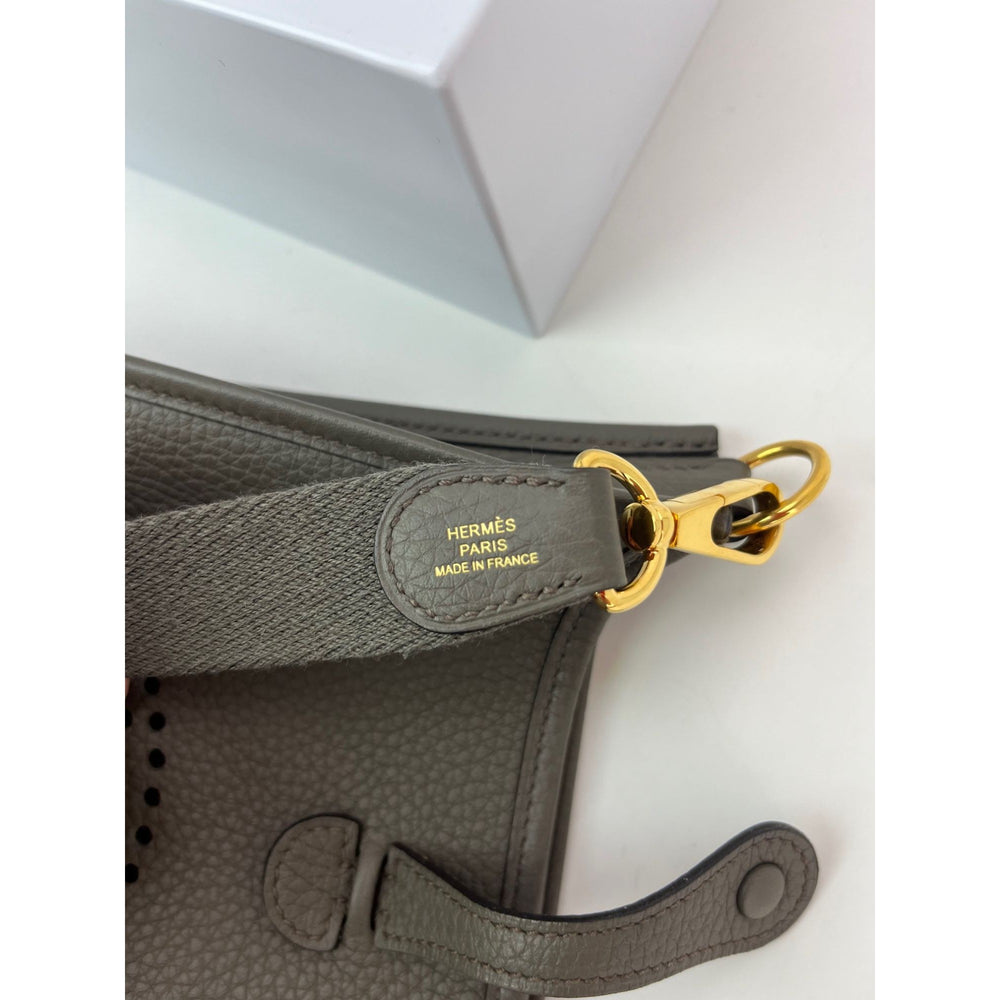 
                  
                    Hermes Taurillon Clemence Evelyne TPM Etoupe Crossbody Bag
                  
                
