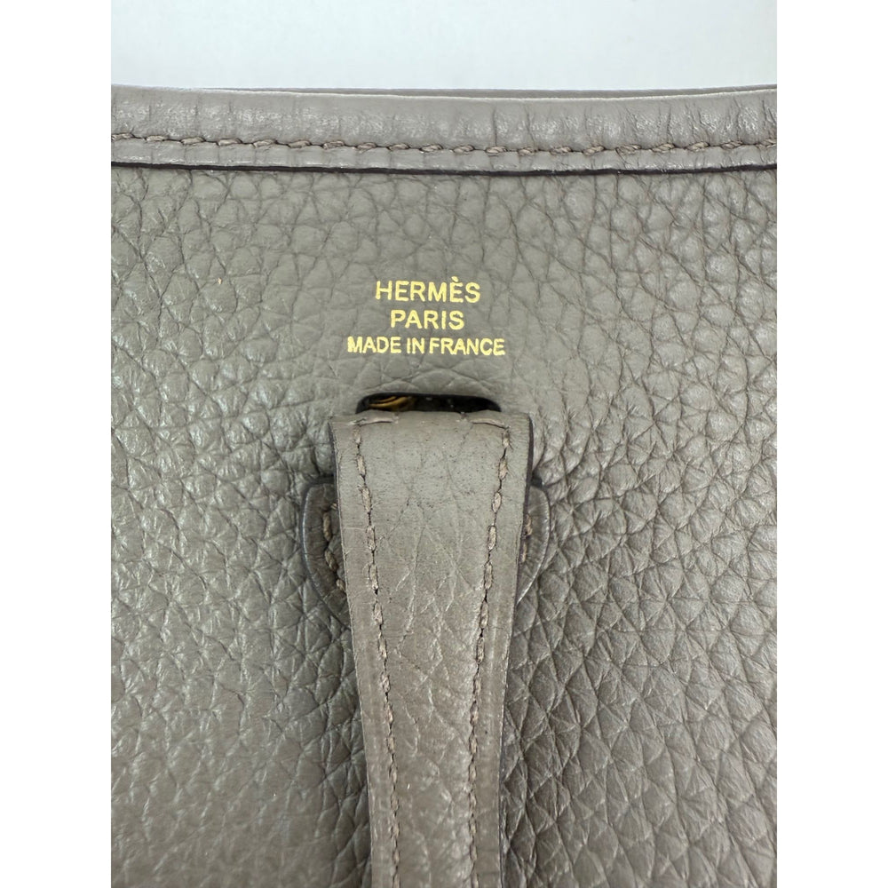 
                  
                    Hermes Taurillon Clemence Evelyne TPM Etoupe Crossbody Bag
                  
                