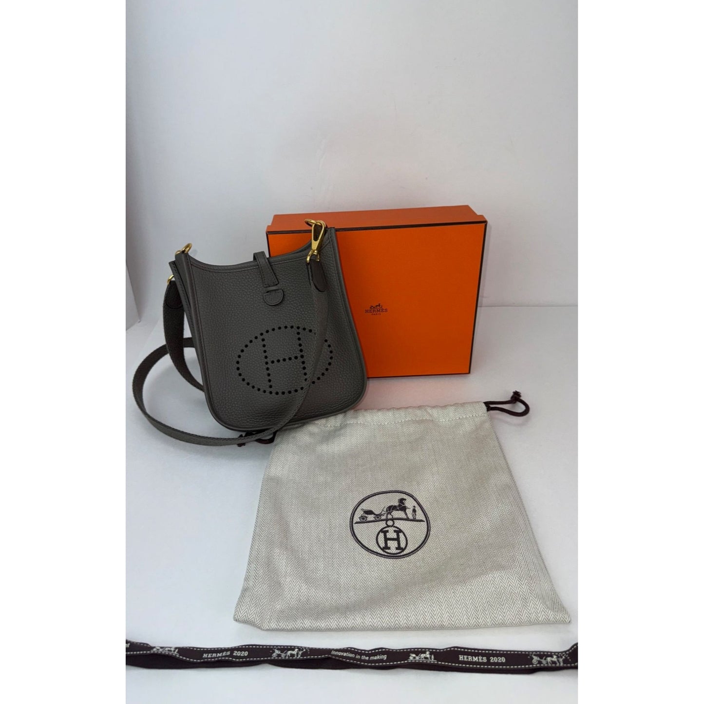 
                  
                    Hermes Taurillon Clemence Evelyne TPM Etoupe Crossbody Bag
                  
                