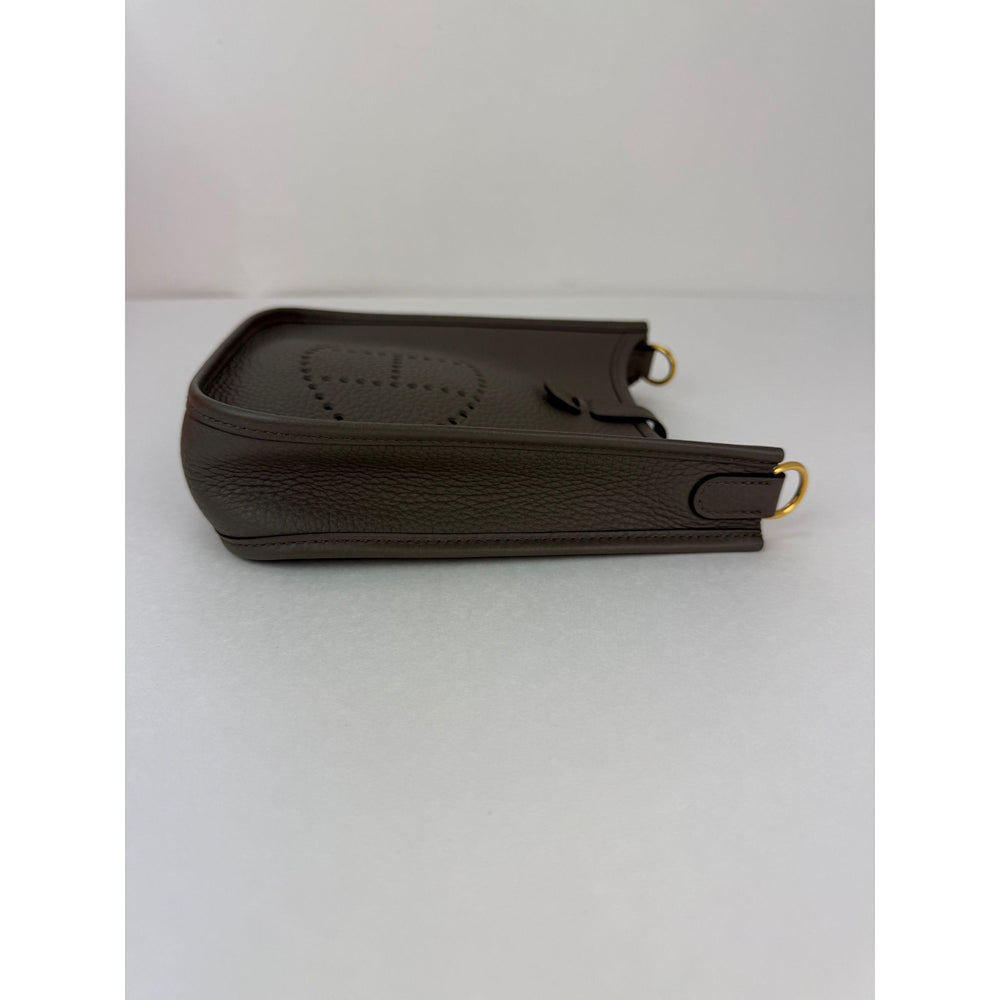 
                  
                    Hermes Taurillon Clemence Evelyne TPM Etoupe Crossbody Bag
                  
                
