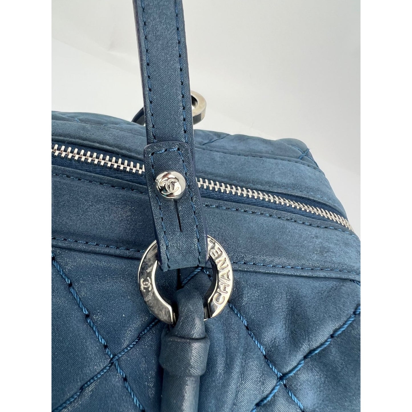 
                  
                    Chanel Relax CC Quilted Calfskin Suede Iridescent Blue Bowler Bag
                  
                