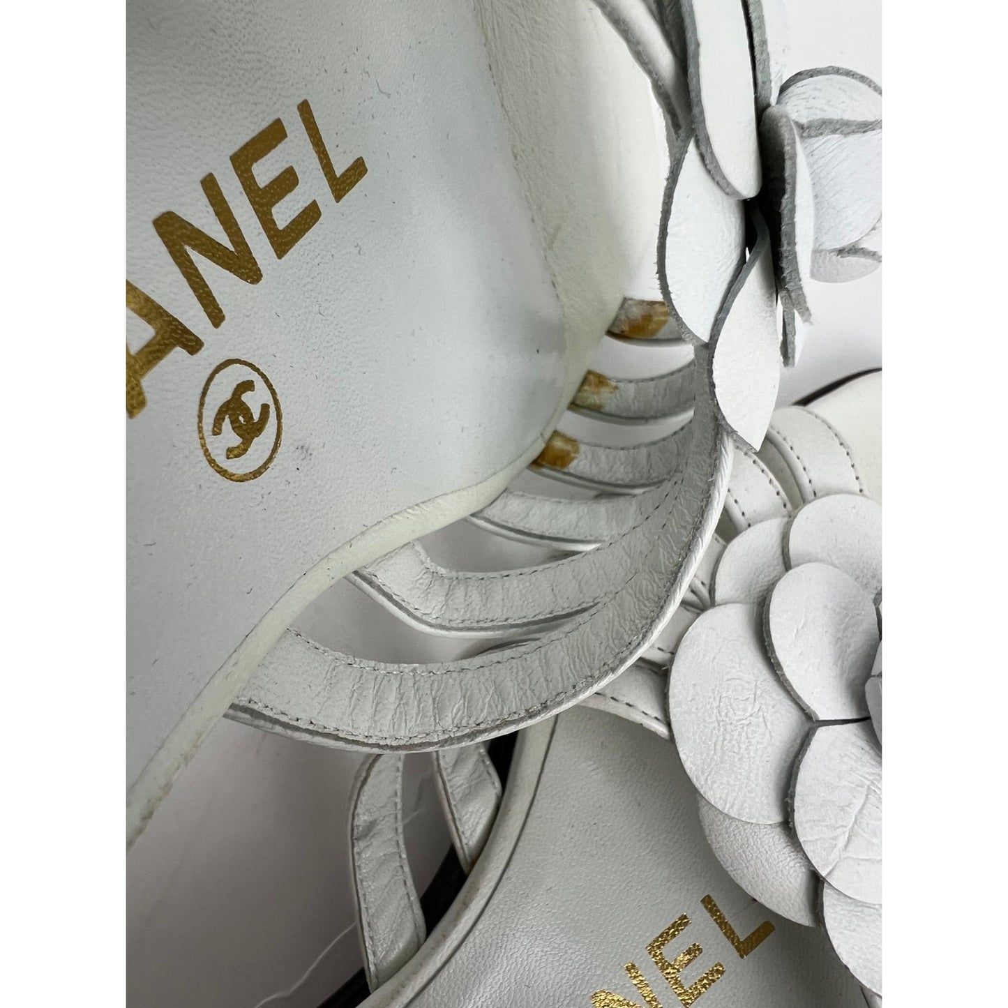 
                  
                    Chanel Cameilla White Leather Slip On Sandals
                  
                