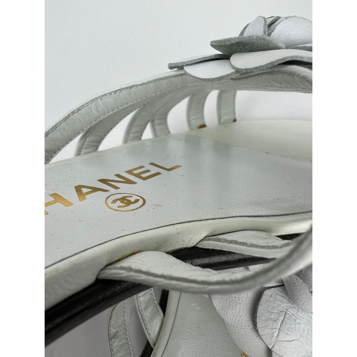 
                  
                    Chanel Cameilla White Leather Slip On Sandals
                  
                