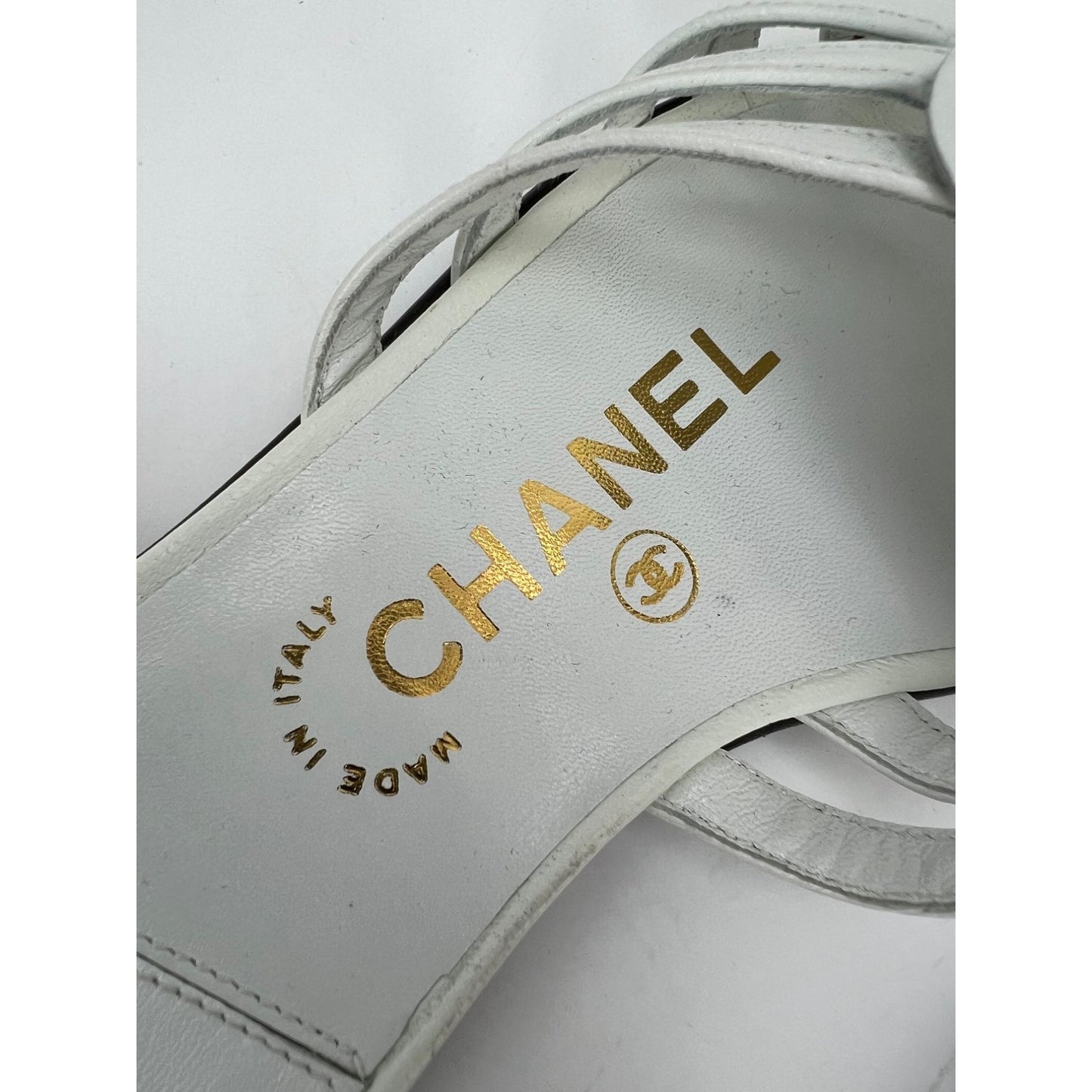 
                  
                    Chanel Cameilla White Leather Slip On Sandals
                  
                