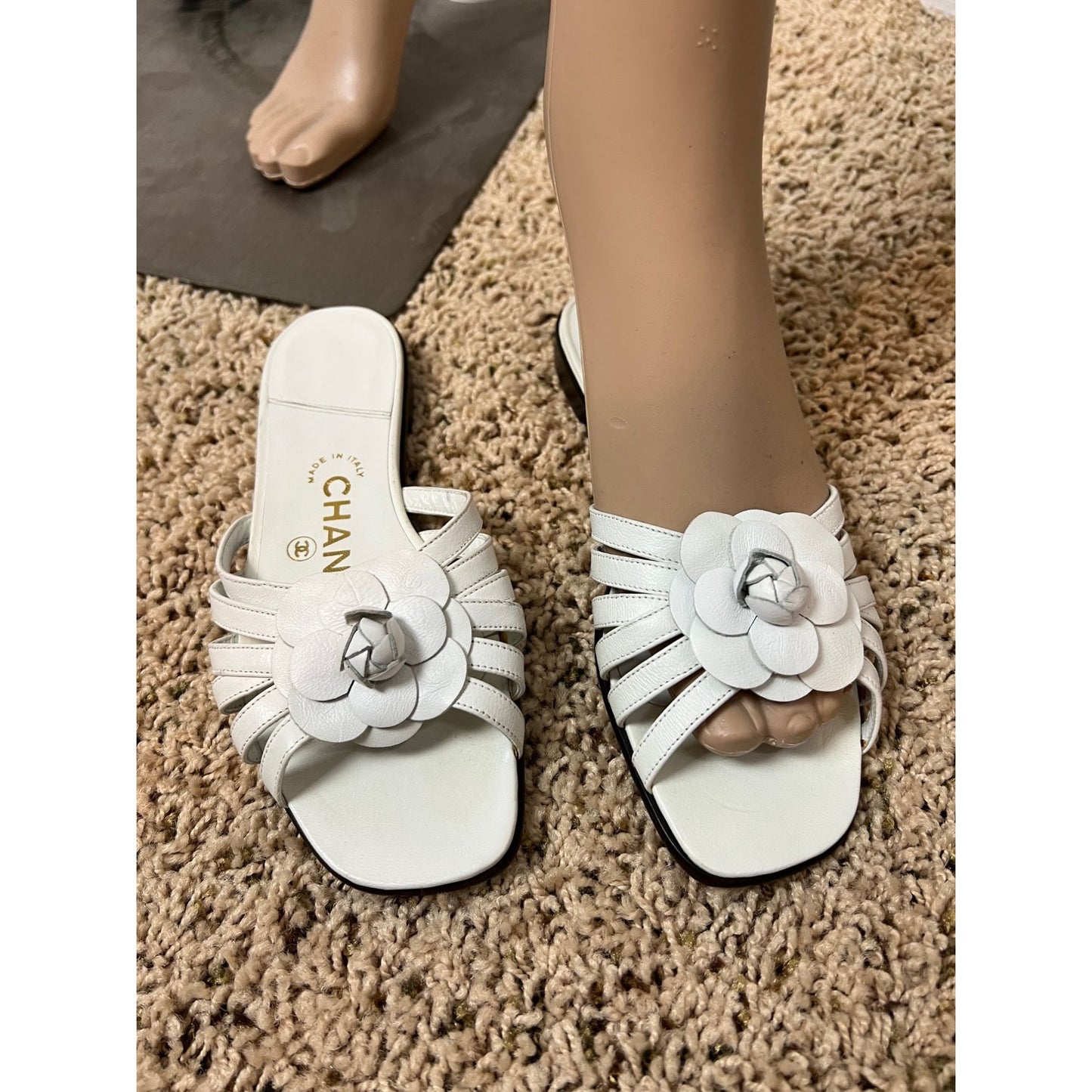 
                  
                    Chanel Cameilla White Leather Slip On Sandals
                  
                