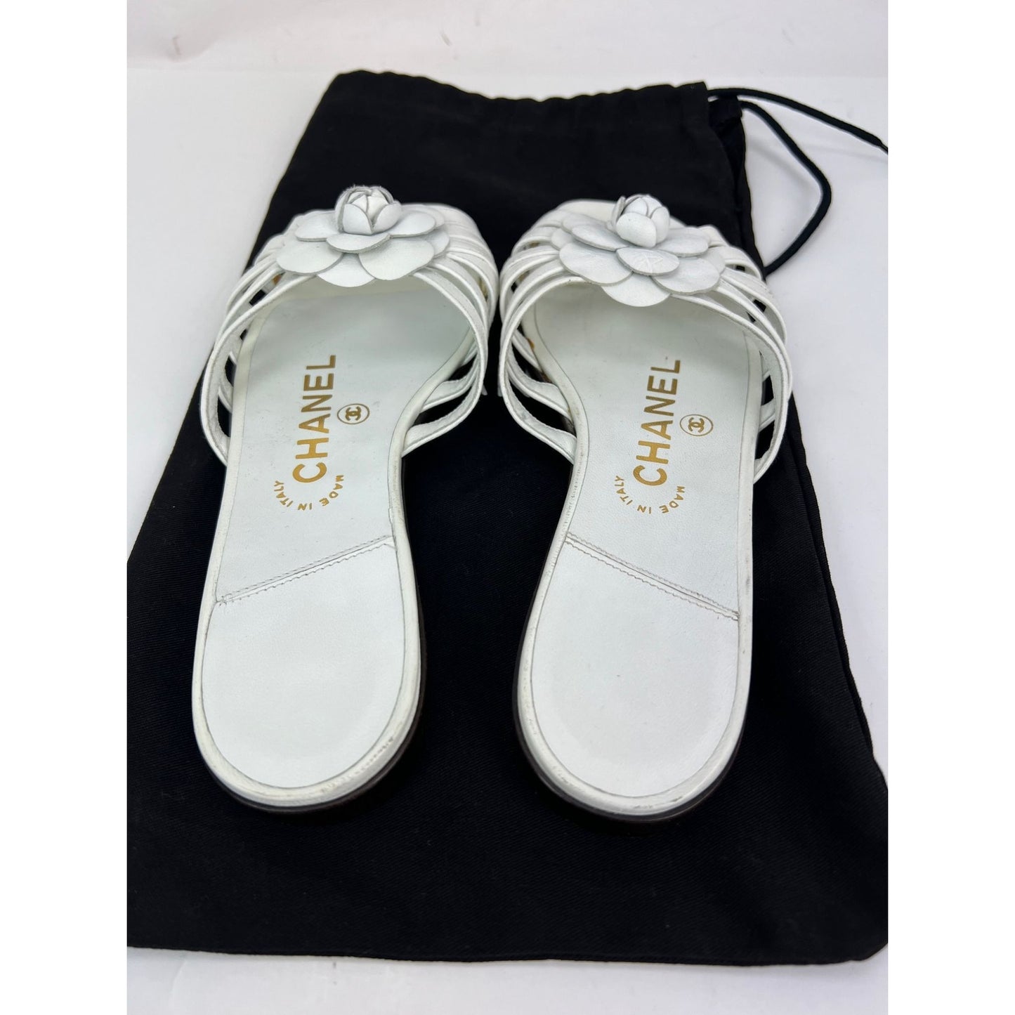 
                  
                    Chanel Cameilla White Leather Slip On Sandals
                  
                