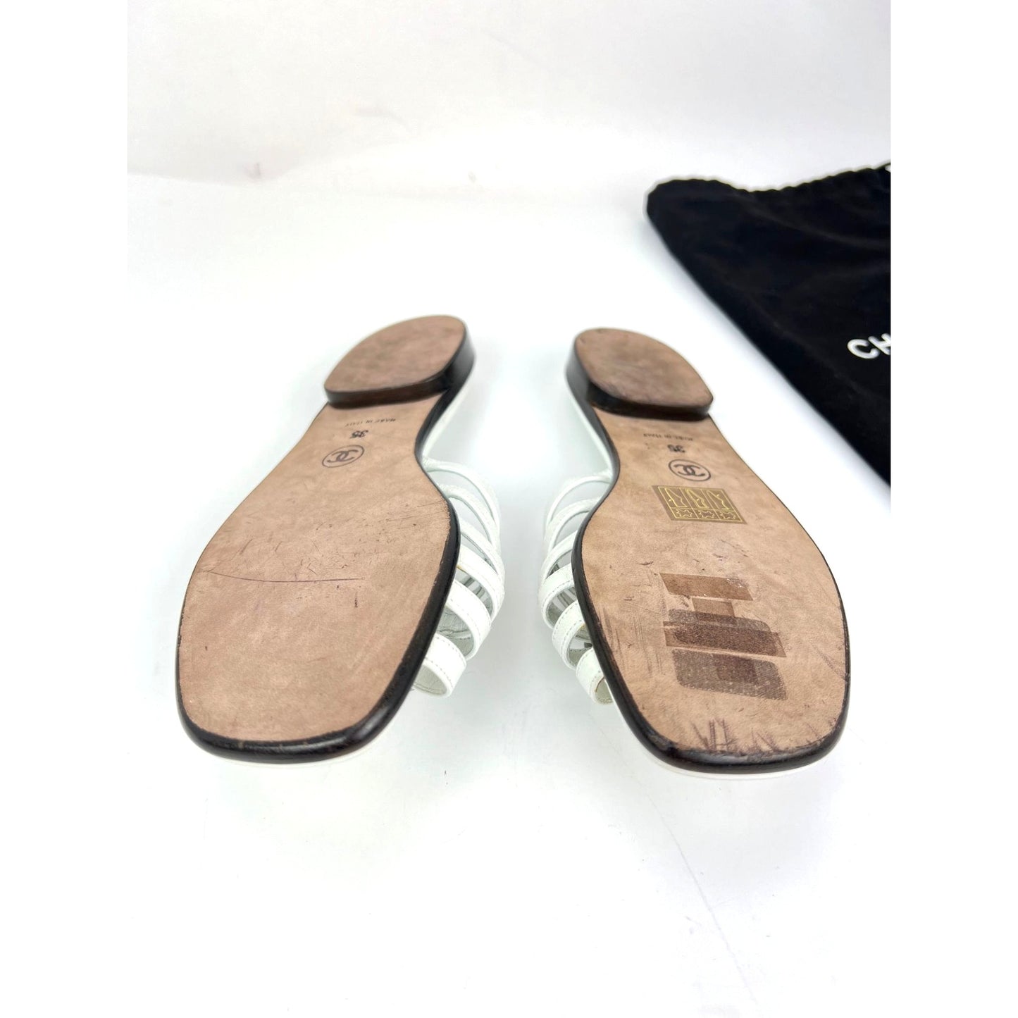 
                  
                    Chanel Cameilla White Leather Slip On Sandals
                  
                