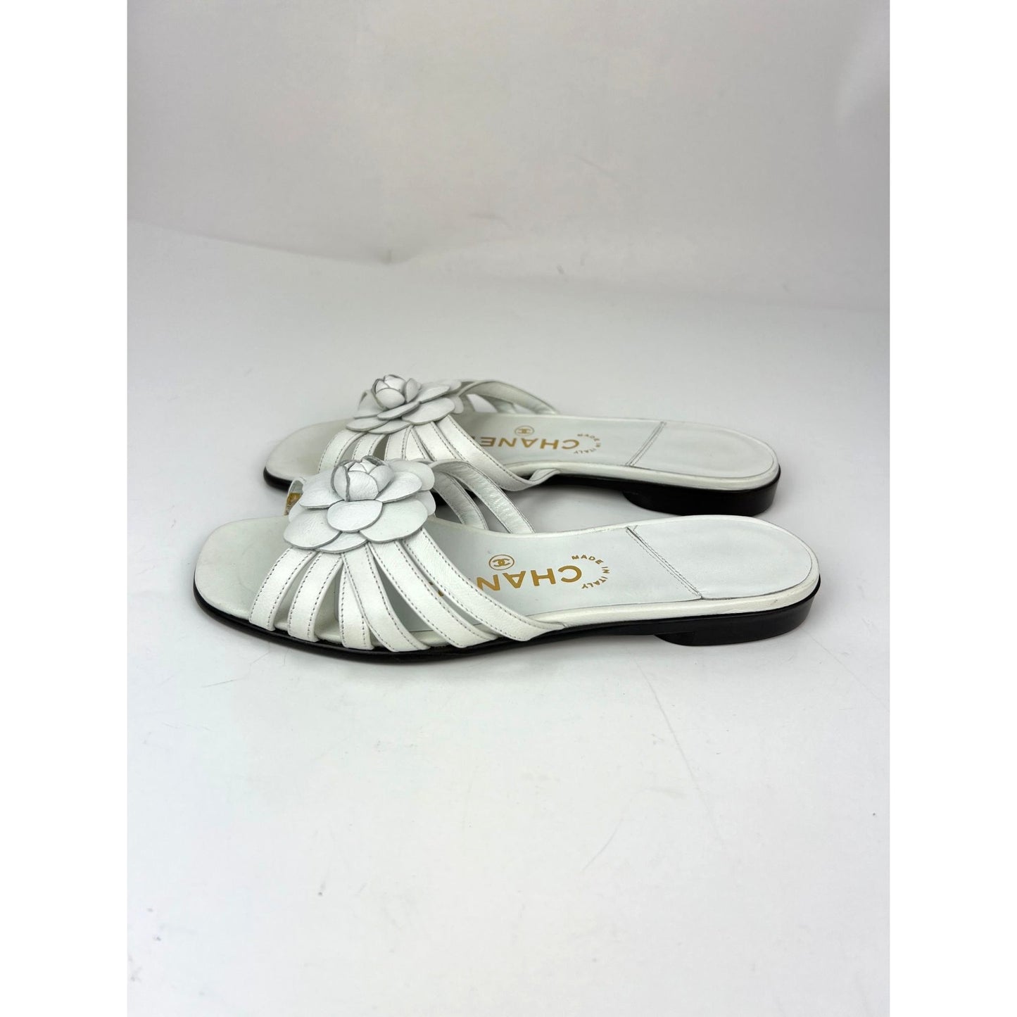 
                  
                    Chanel Cameilla White Leather Slip On Sandals
                  
                