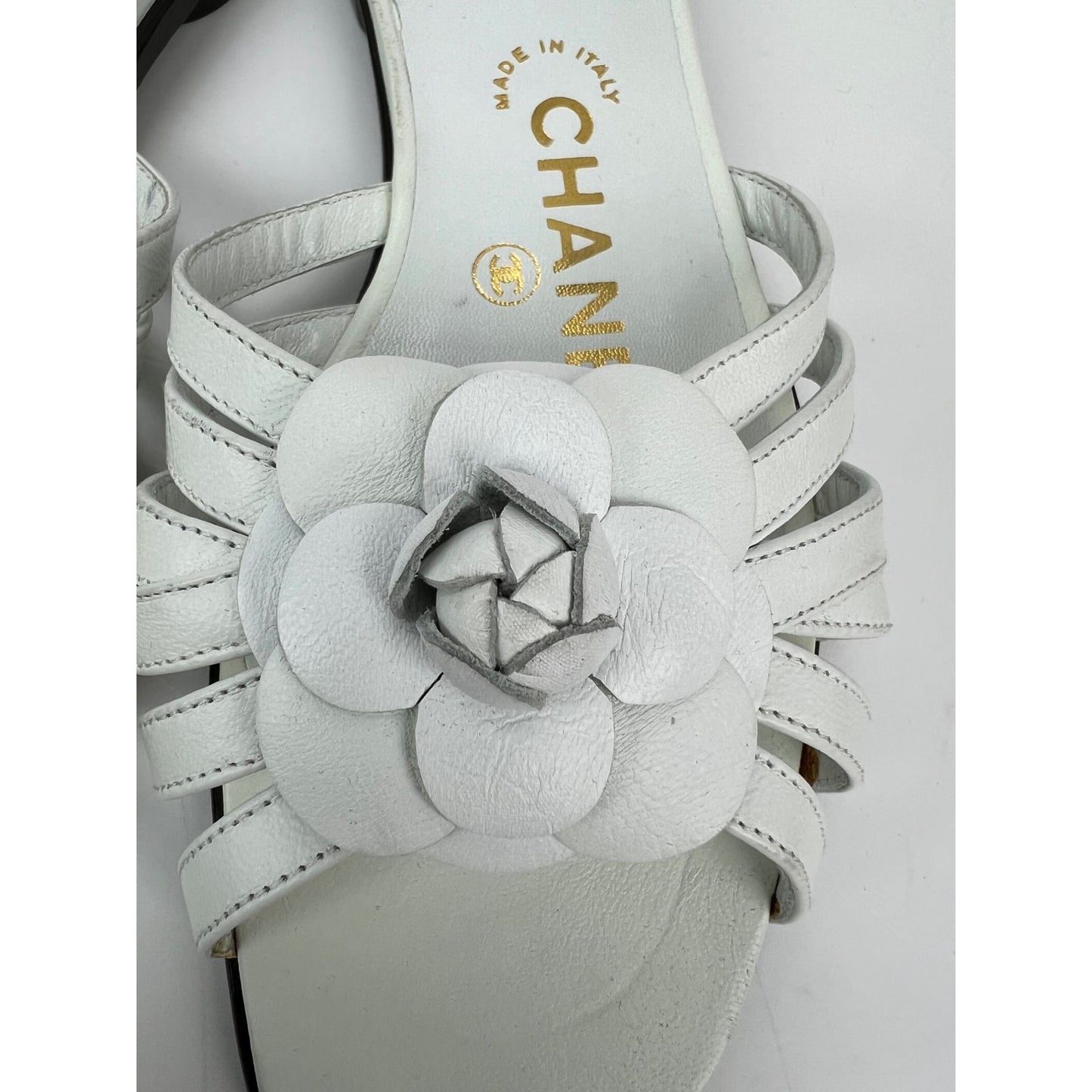
                  
                    Chanel Cameilla White Leather Slip On Sandals
                  
                