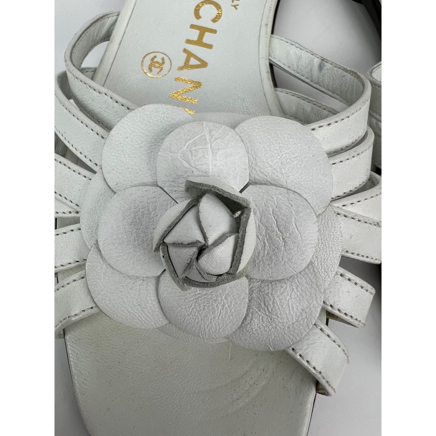 
                  
                    Chanel Cameilla White Leather Slip On Sandals
                  
                