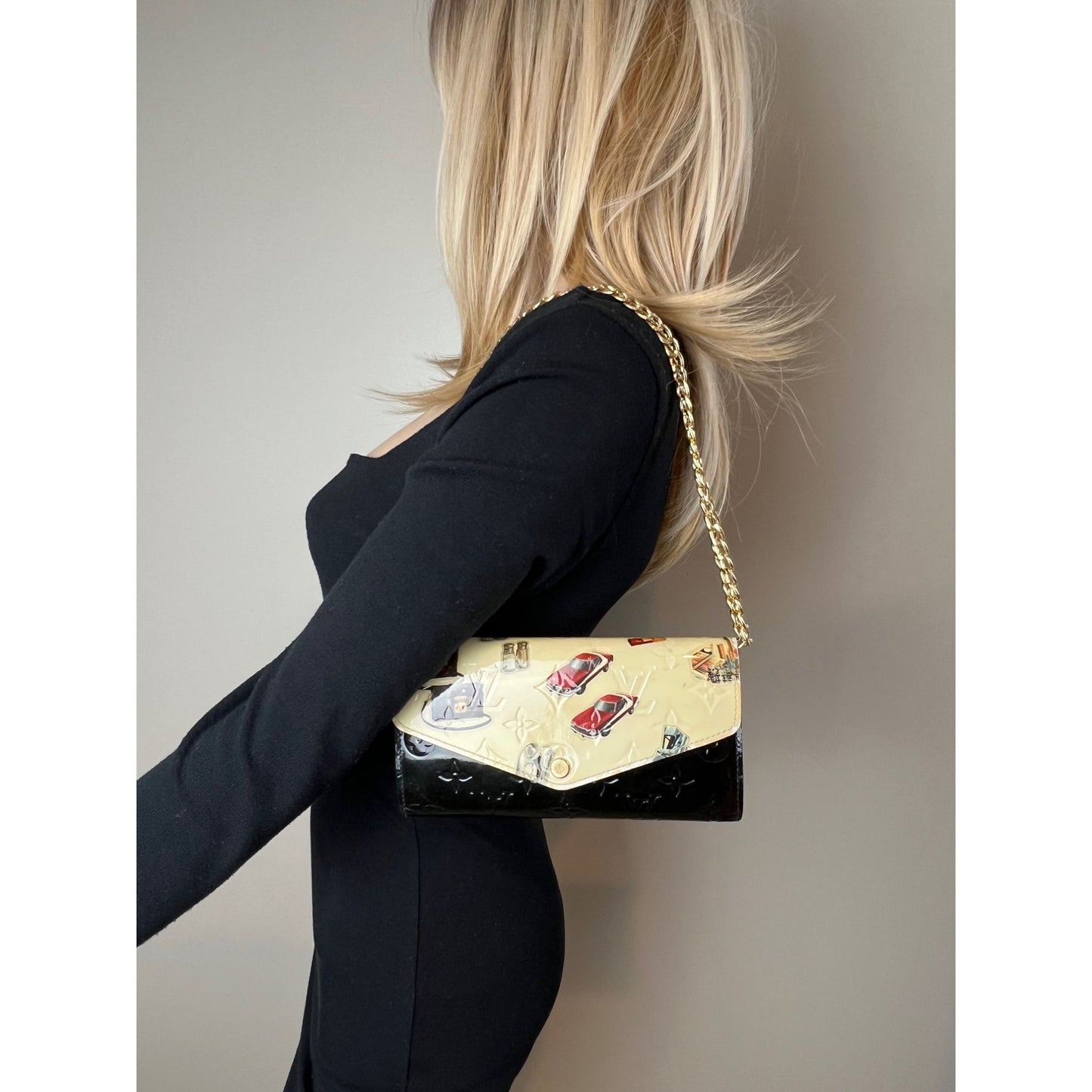 
                  
                    Louis Vuitton Sarah Monogram Vernis Stickers Black Wallet Limited Edition
                  
                