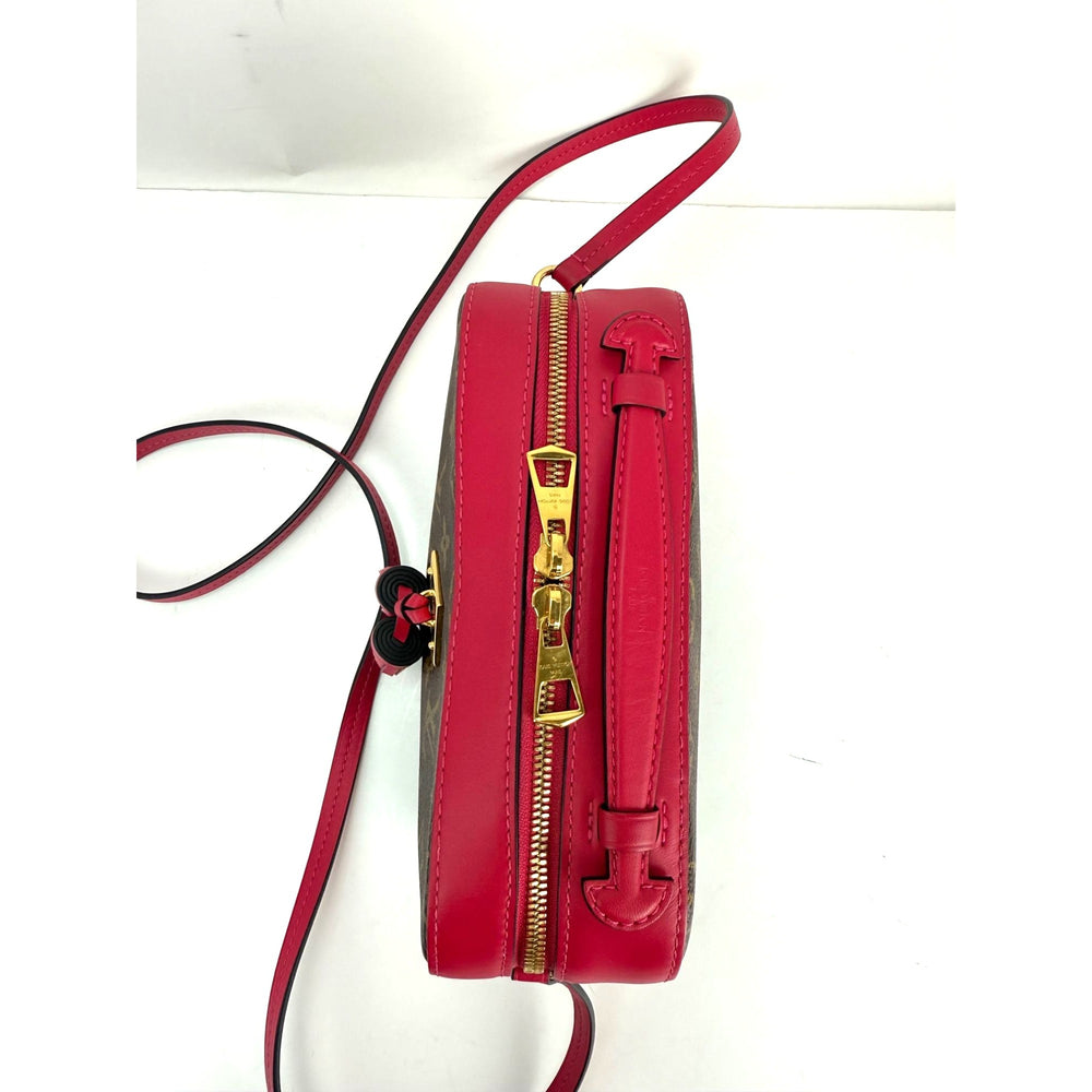 
                  
                    Louis Vuitton Saintonge Fuchsia Monogram Crossbody Bag Tassel
                  
                