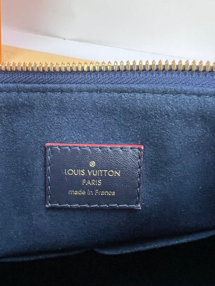 
                  
                    Louis Vuitton V Tote MM Blue Empreinte Leather Shoulder Bag
                  
                