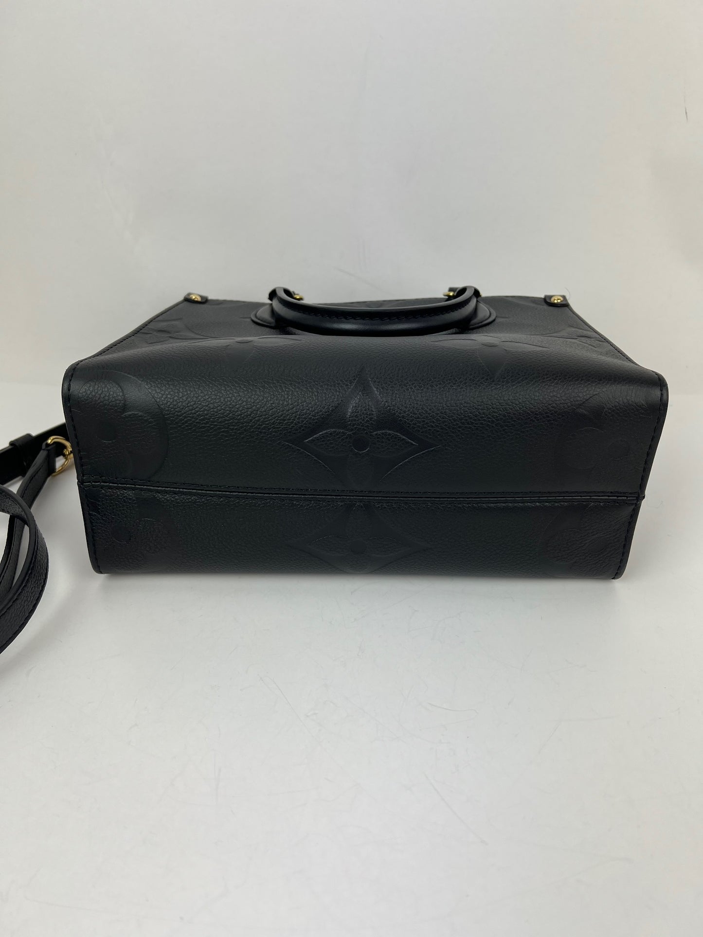 
                  
                    Louis Vuitton OnTheGo PM Giant Monogram Empreinte Black Leather Tote
                  
                