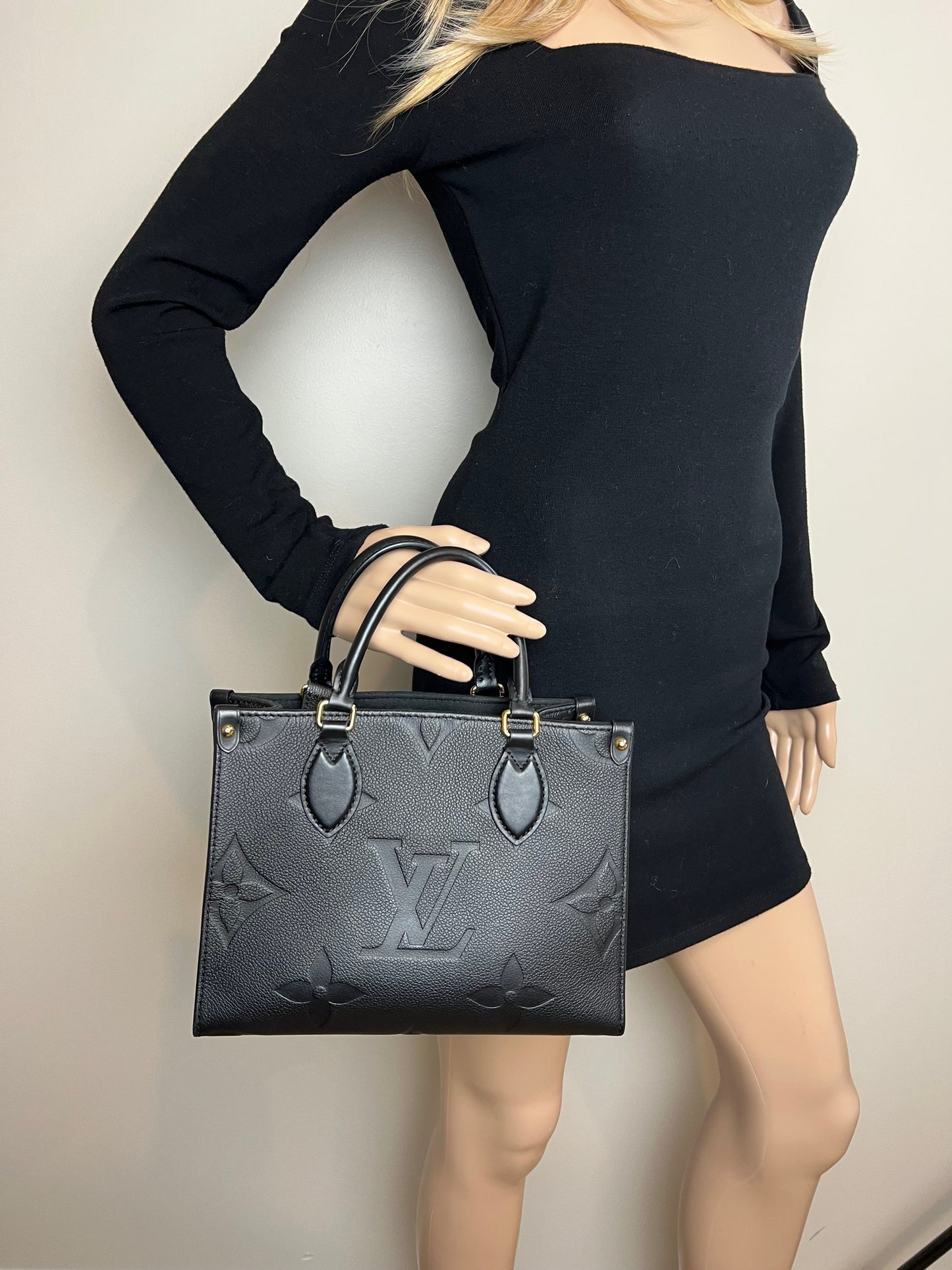 
                  
                    Louis Vuitton OnTheGo PM Giant Monogram Empreinte Black Leather Tote
                  
                