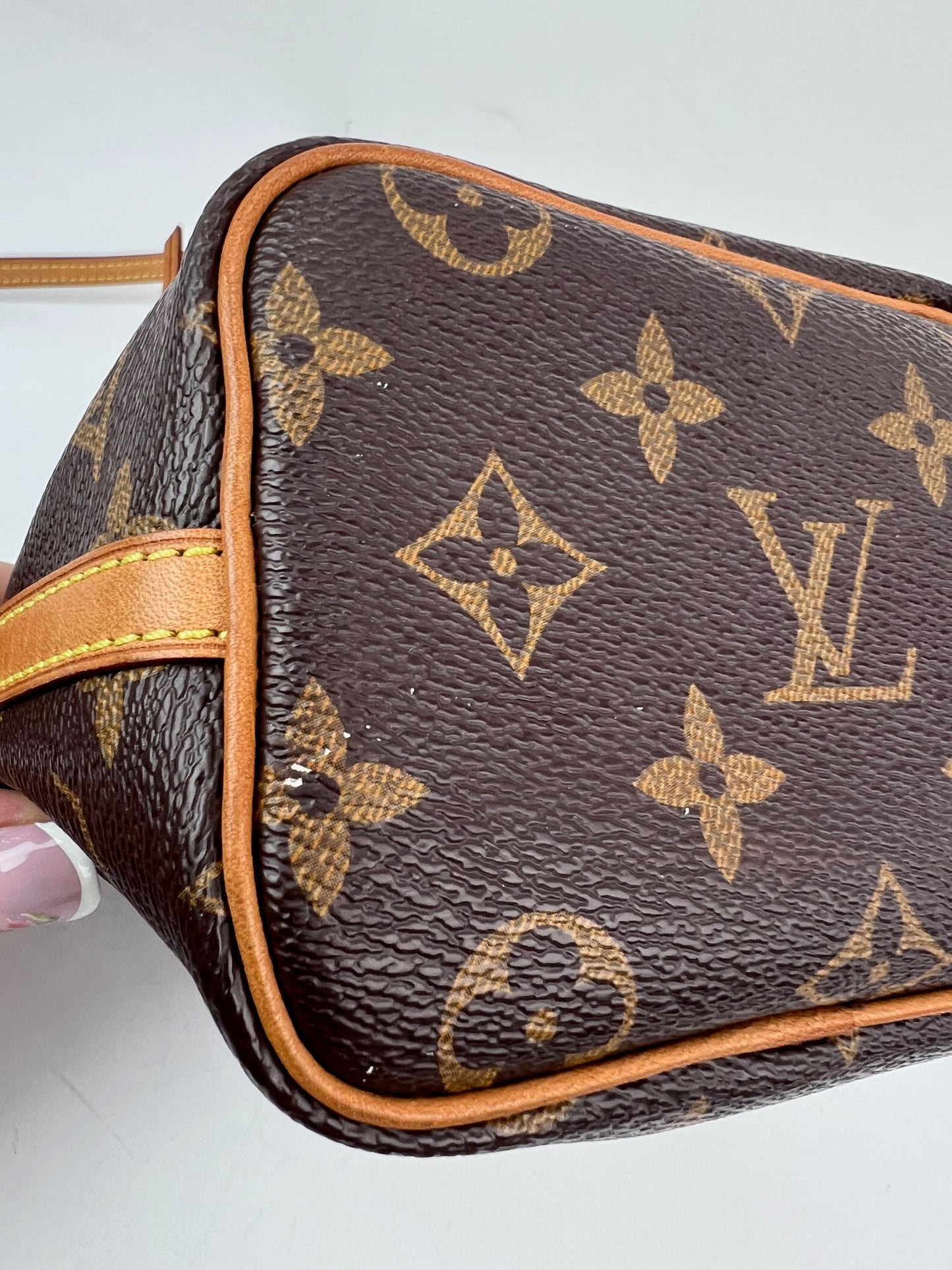 
                  
                    Louis Vuitton Monogram Nano Noe Bucket Crossbody Bag
                  
                