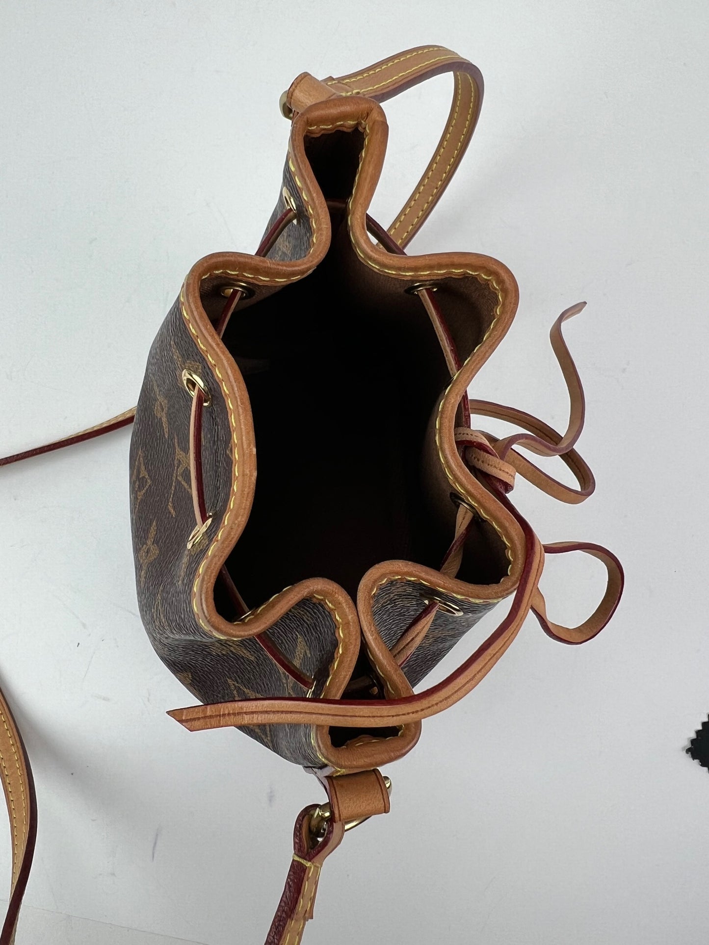 
                  
                    Louis Vuitton Monogram Nano Noe Bucket Crossbody Bag
                  
                