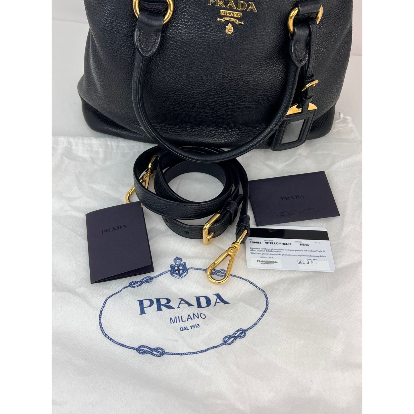 
                  
                    Prada Vitello Phenix Top Handle Black Leather Crossbody Bag
                  
                