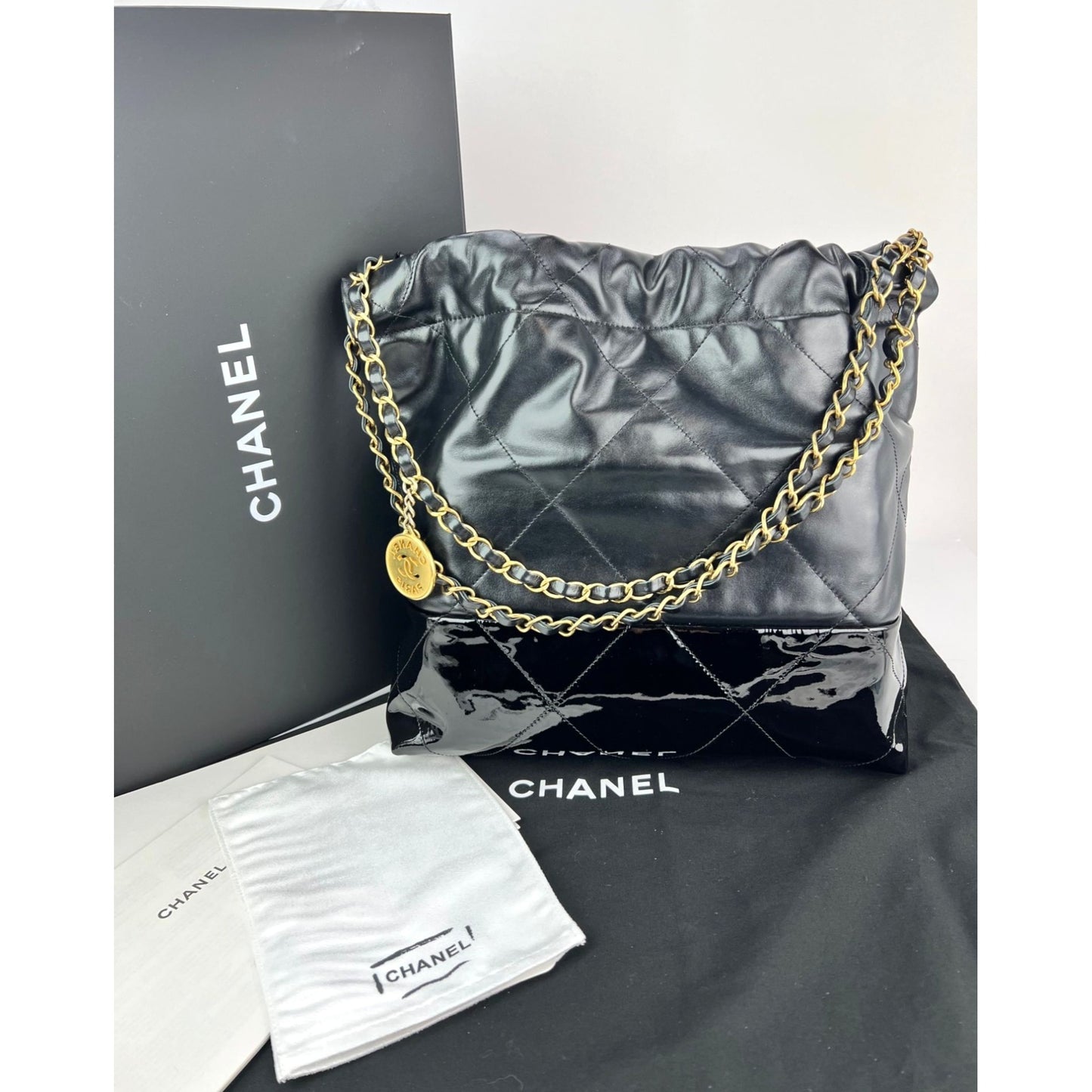 
                  
                    Chanel 22 Small Black Shiny And Patent Calfskin Gold Harware Shoulder Bag
                  
                