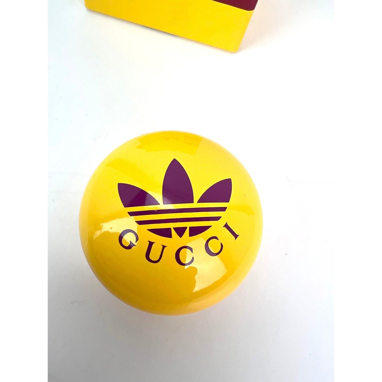 
                  
                    Gucci x Adidas Yellow Wood Yoyo
                  
                