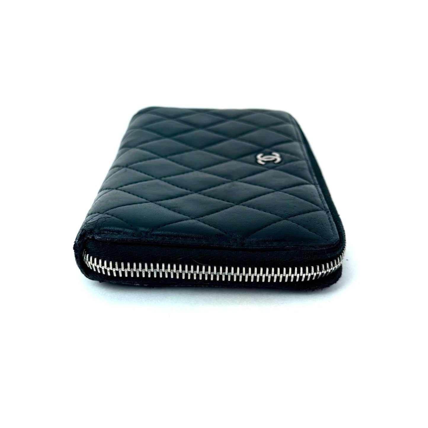
                  
                    Chanel Classic Quilted Smooth Lambskin Zip Around Black Wallet
                  
                