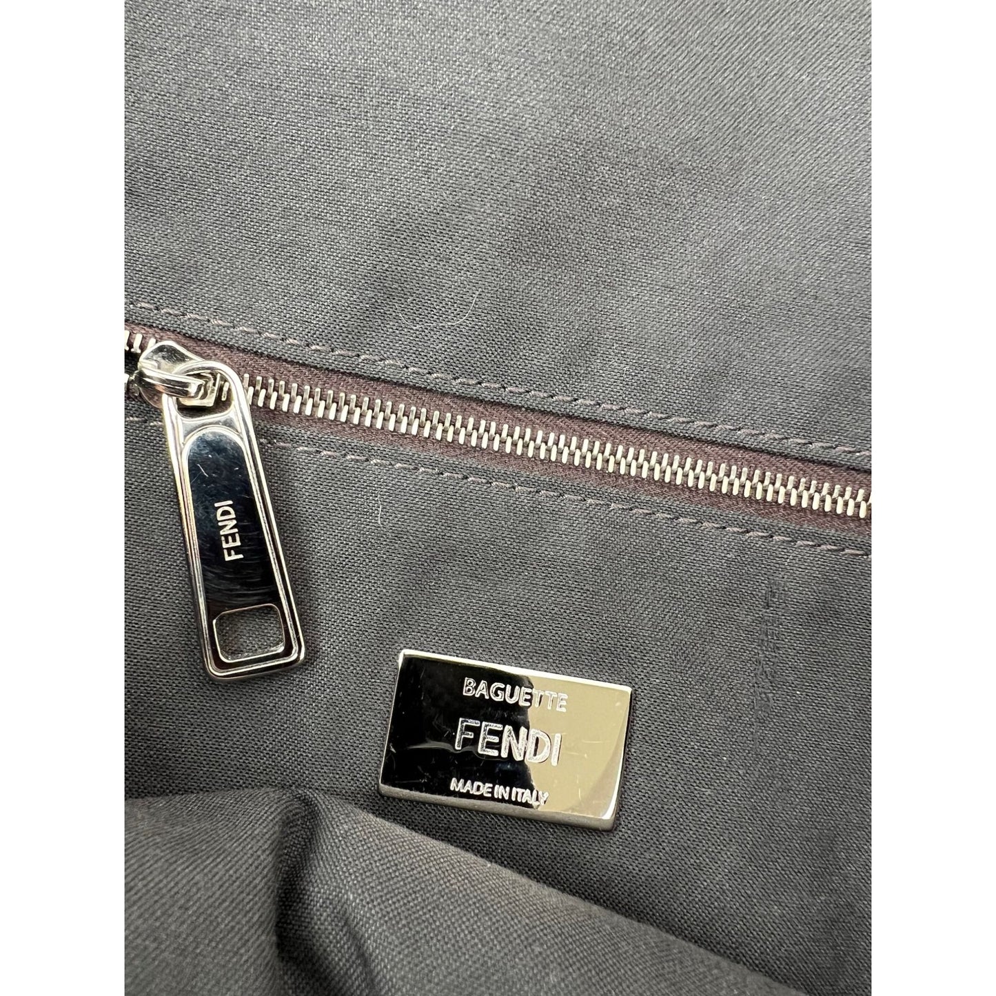 
                  
                    Fendi Zucca FF Multipocket Baguette 1974 Maxi Shoulder Bag
                  
                