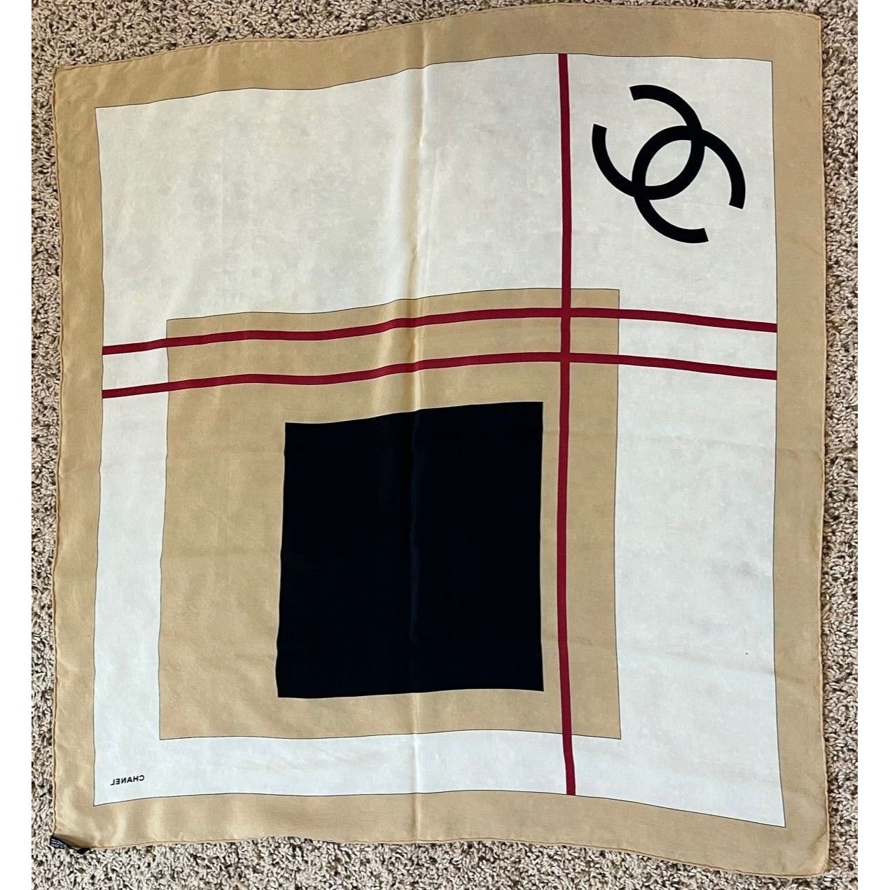 
                  
                    Chanel Beige Black Red Silk Logo Modern Design Scarf
                  
                