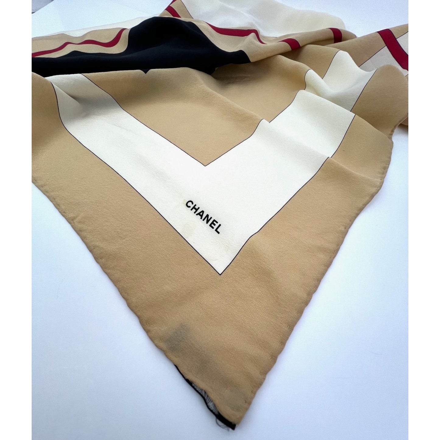 
                  
                    Chanel Beige Black Red Silk Logo Modern Design Scarf
                  
                