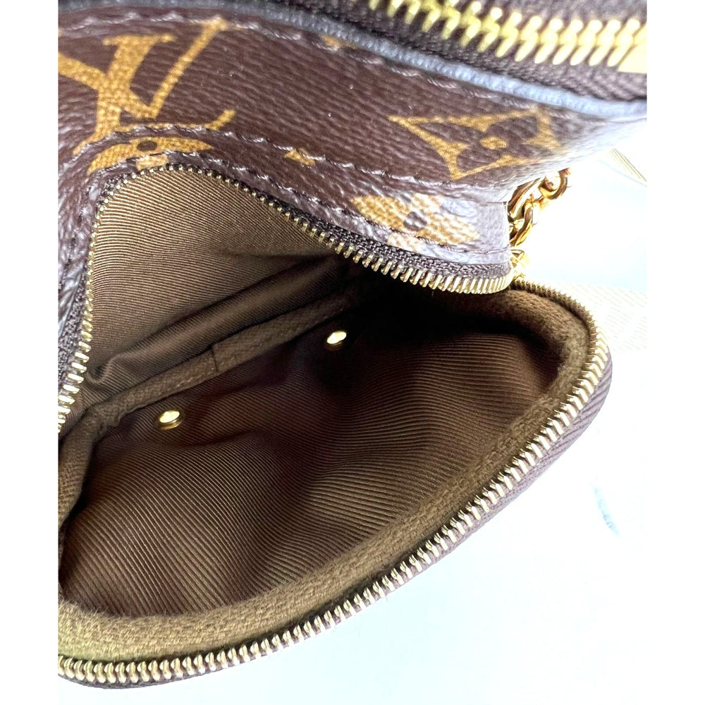 
                  
                    Louis Vuitton Utility Phone Sleeve Monogram Crossbody Shoulder Bag
                  
                