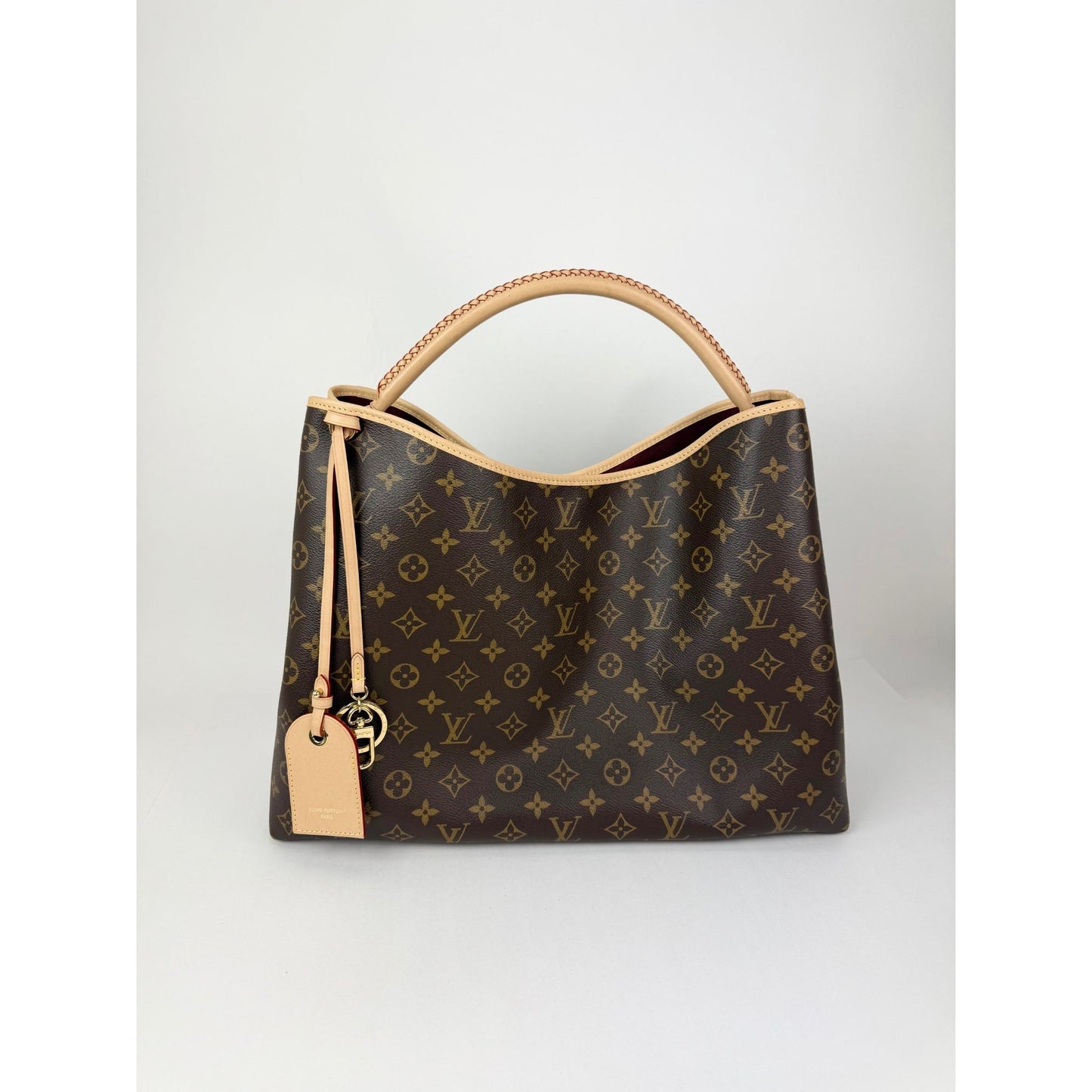 
                  
                    Louis Vuitton Again Monogram Canvas Tote
                  
                