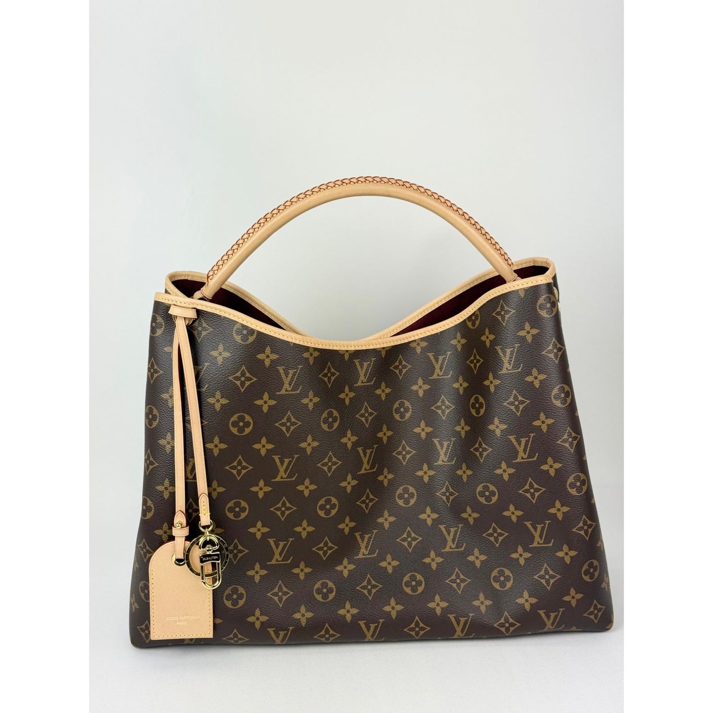 
                  
                    Louis Vuitton Again Monogram Canvas Tote
                  
                